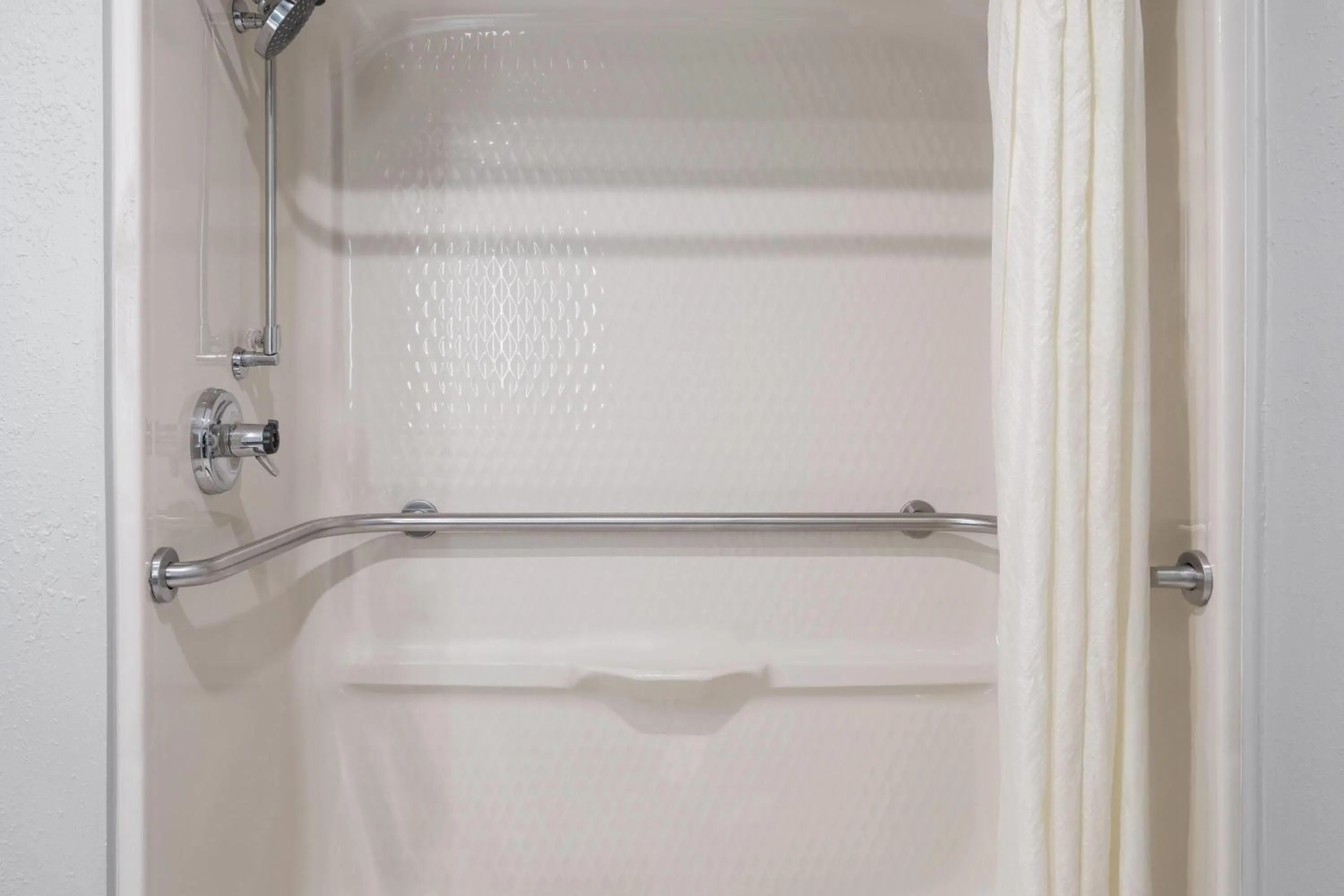 Shower in AmericInn by Wyndham Urbana Champaign University Area