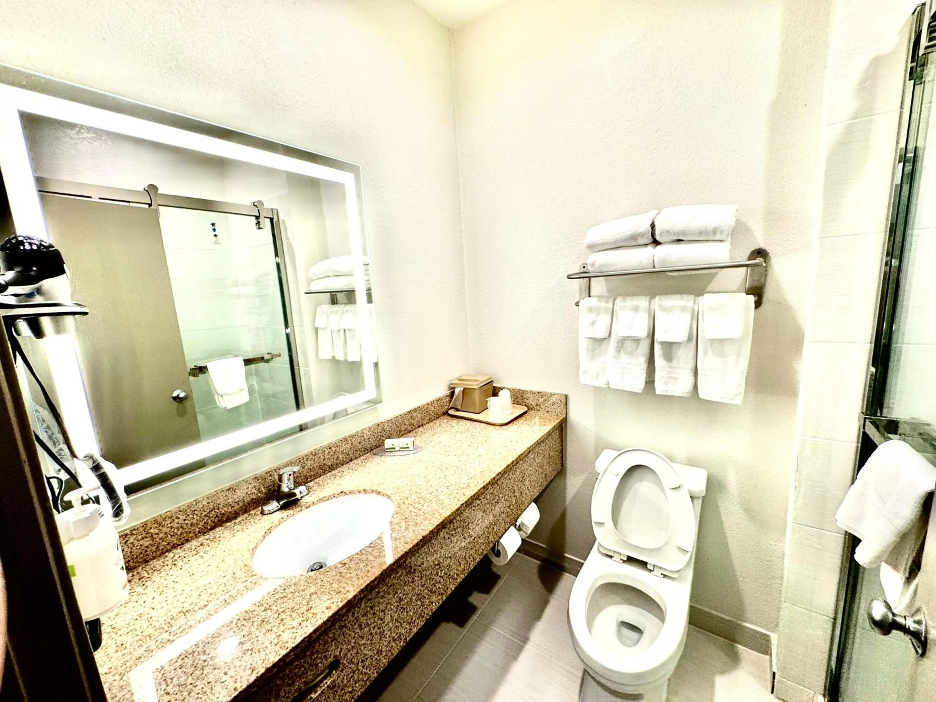 Bathroom in Baymont by Wyndham Richmond I-70