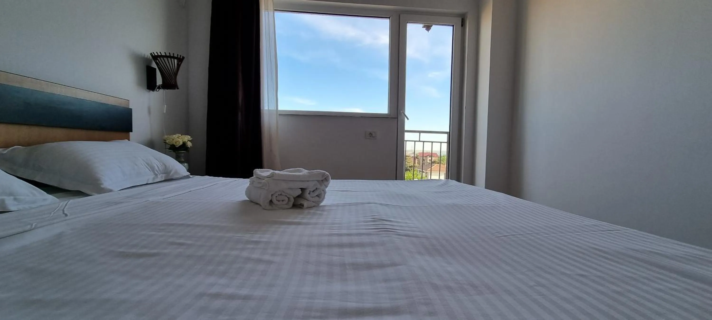 Bed in Hotel Blue Sky Resort