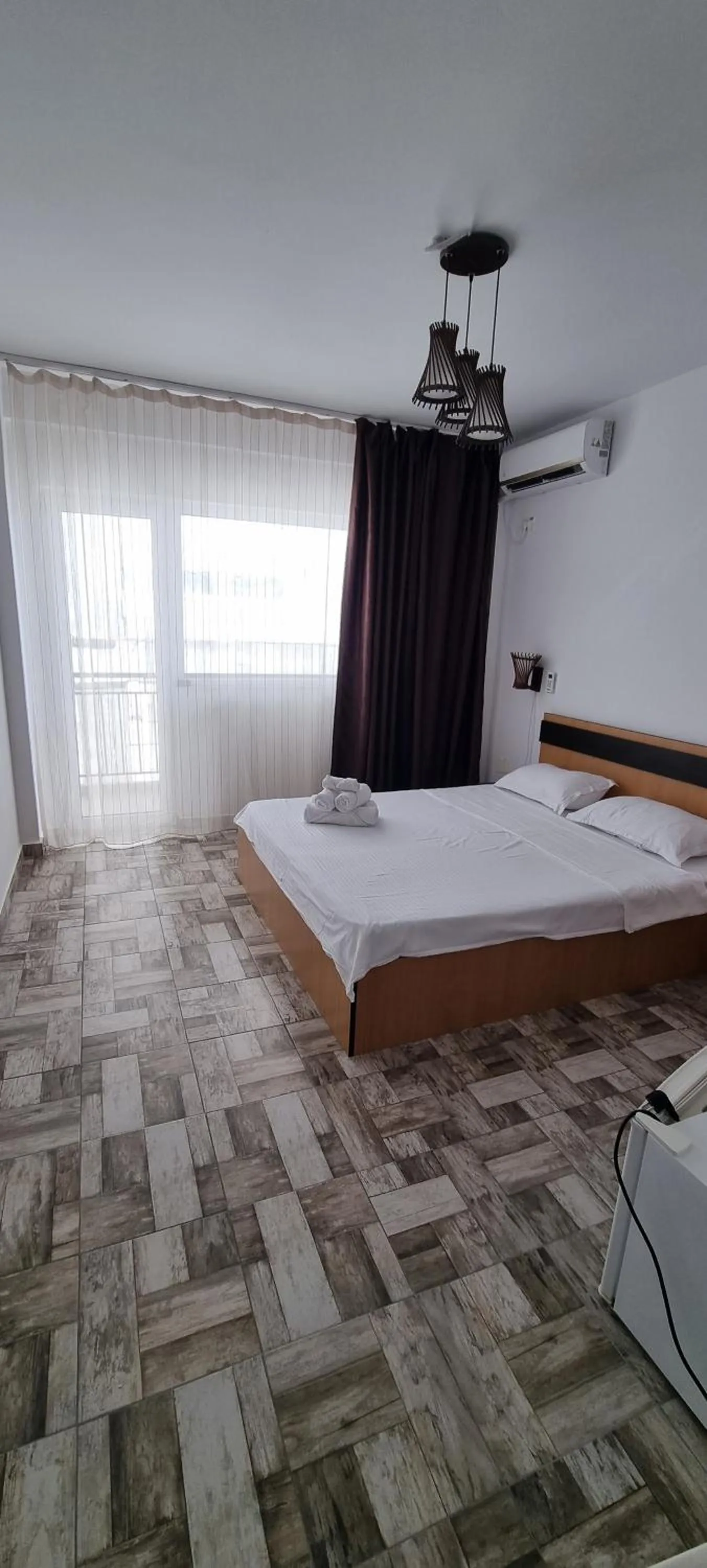 Bed in Hotel Blue Sky Resort