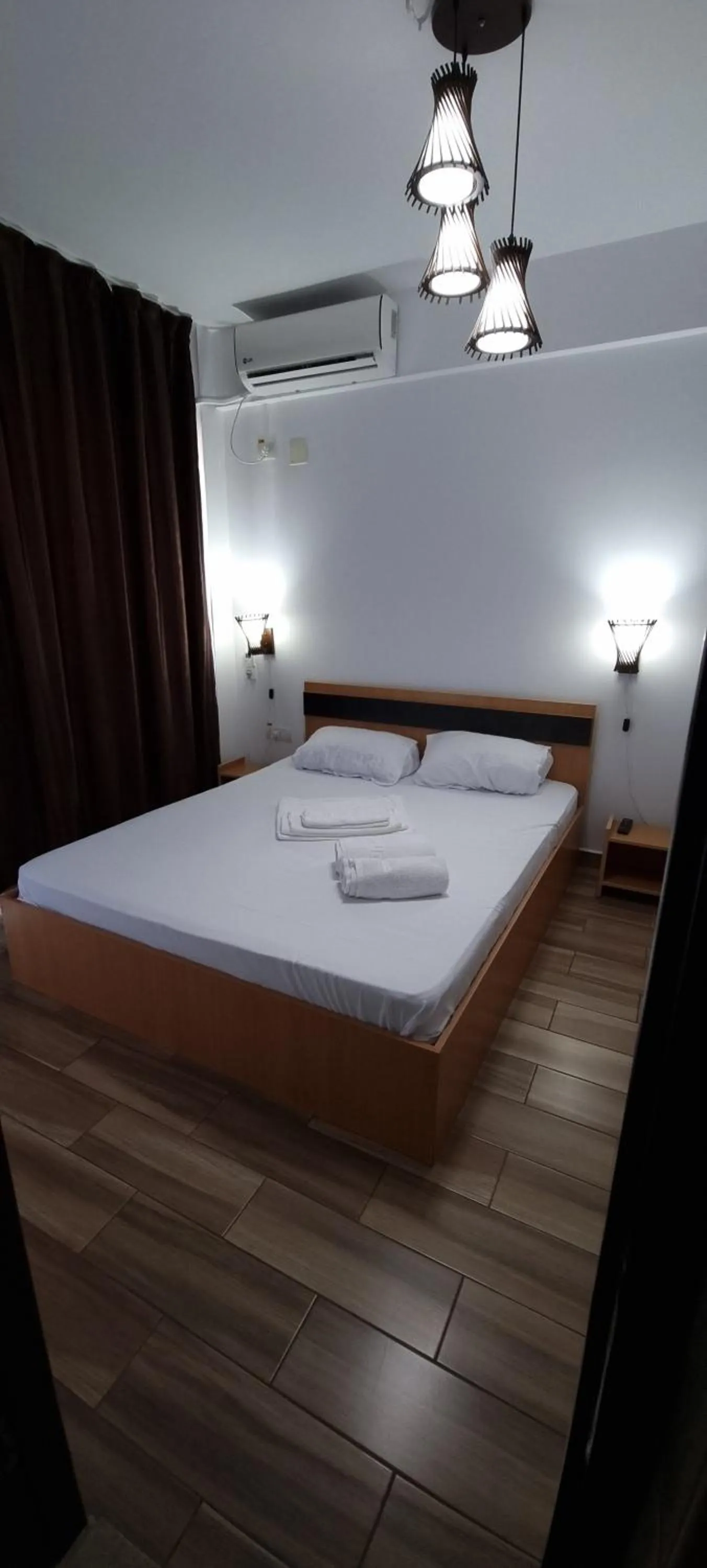 Bed in Hotel Blue Sky Resort