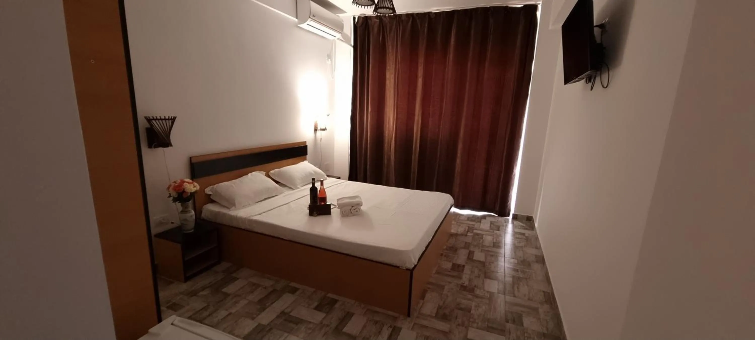 Bed in Hotel Blue Sky Resort