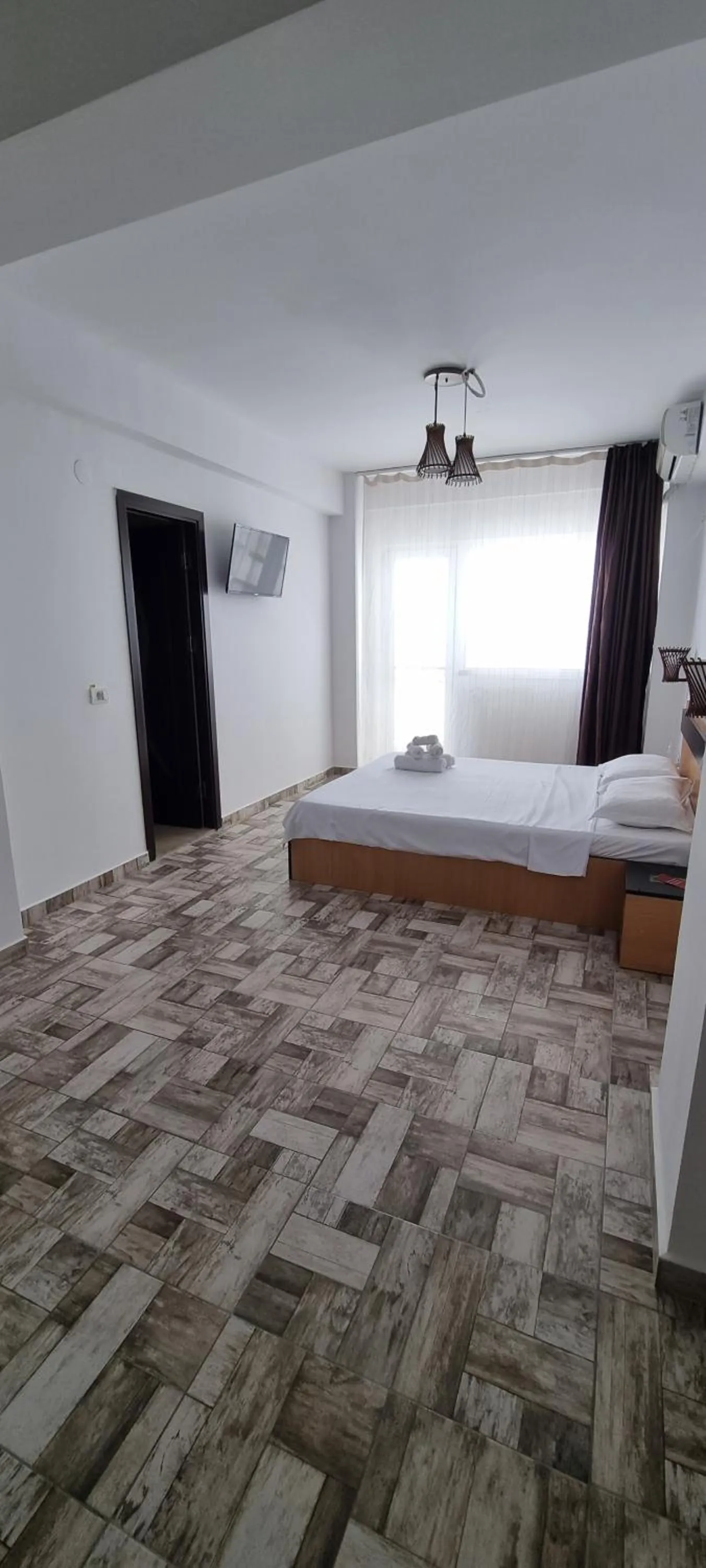 Bed in Hotel Blue Sky Resort