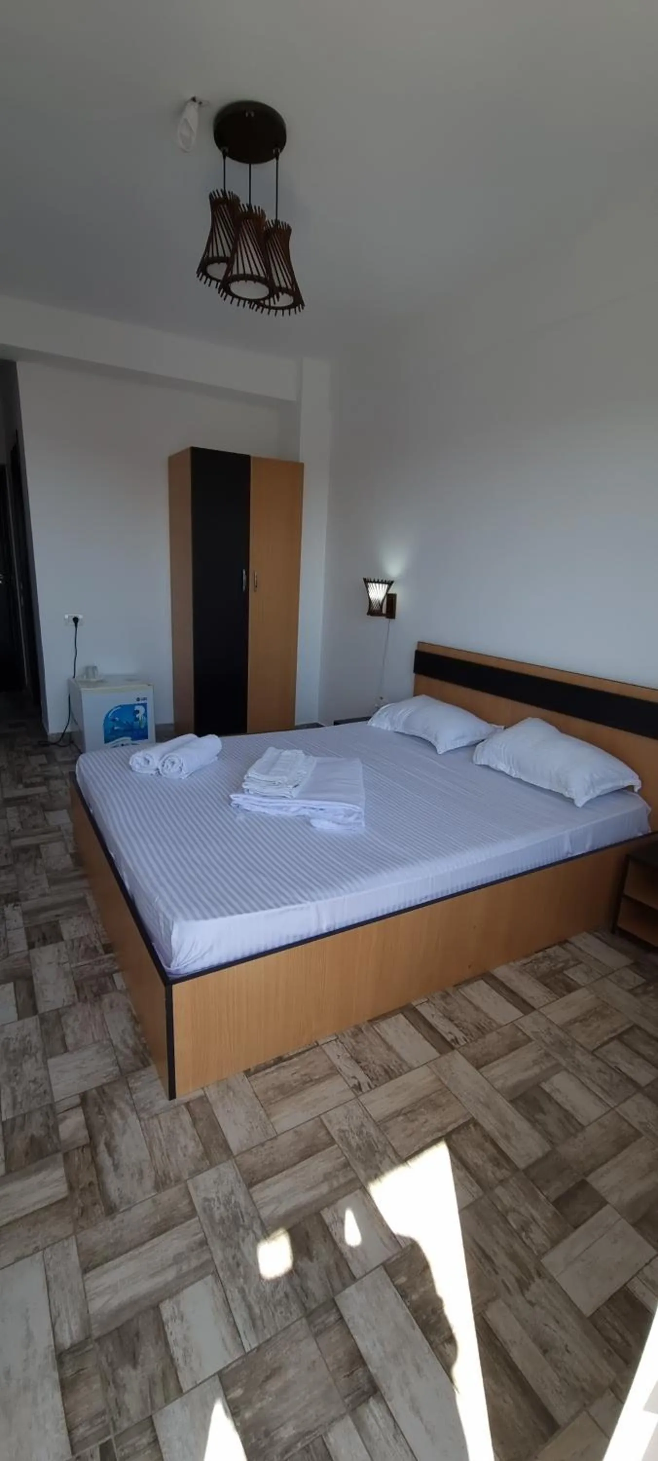 Bed in Hotel Blue Sky Resort