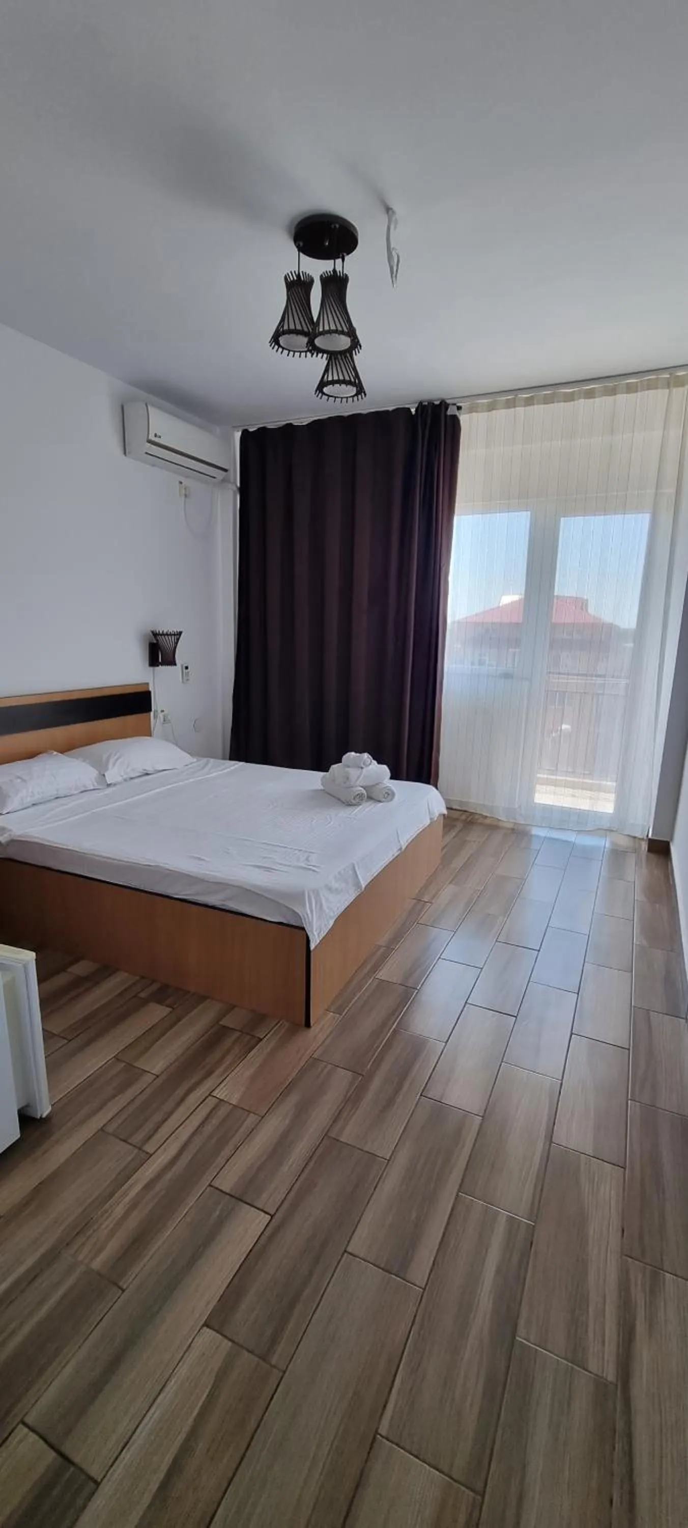 Bed in Hotel Blue Sky Resort