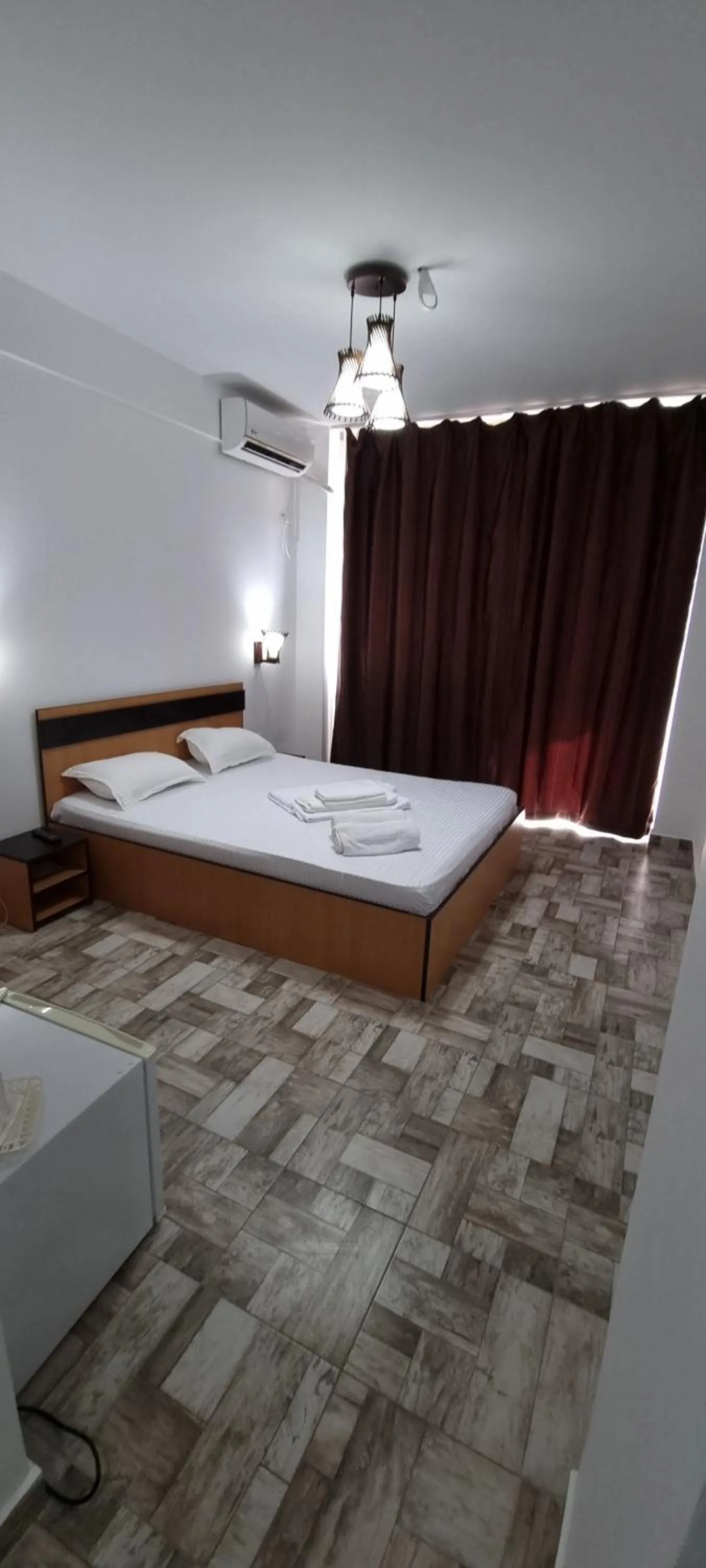 Bed in Hotel Blue Sky Resort