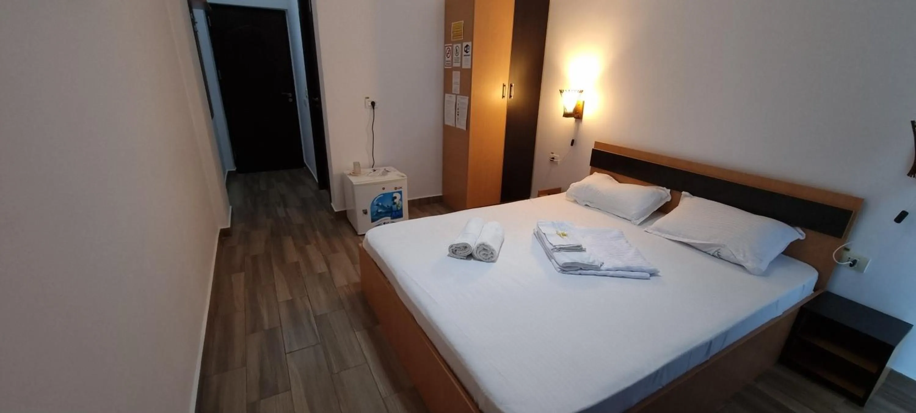 Bed in Hotel Blue Sky Resort