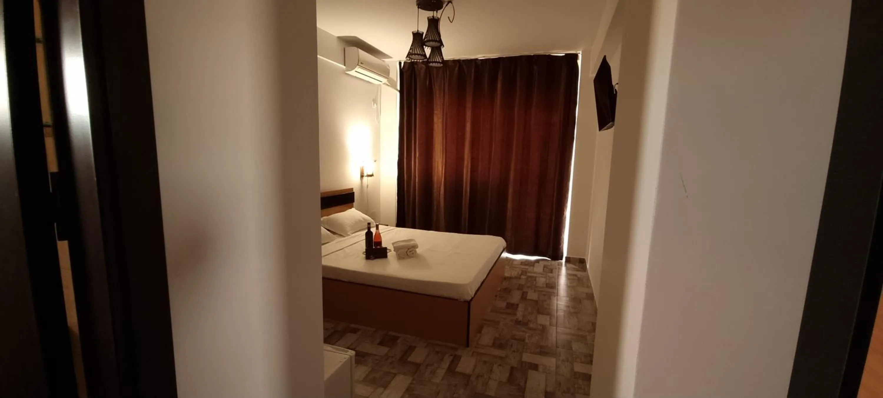 Bed in Hotel Blue Sky Resort