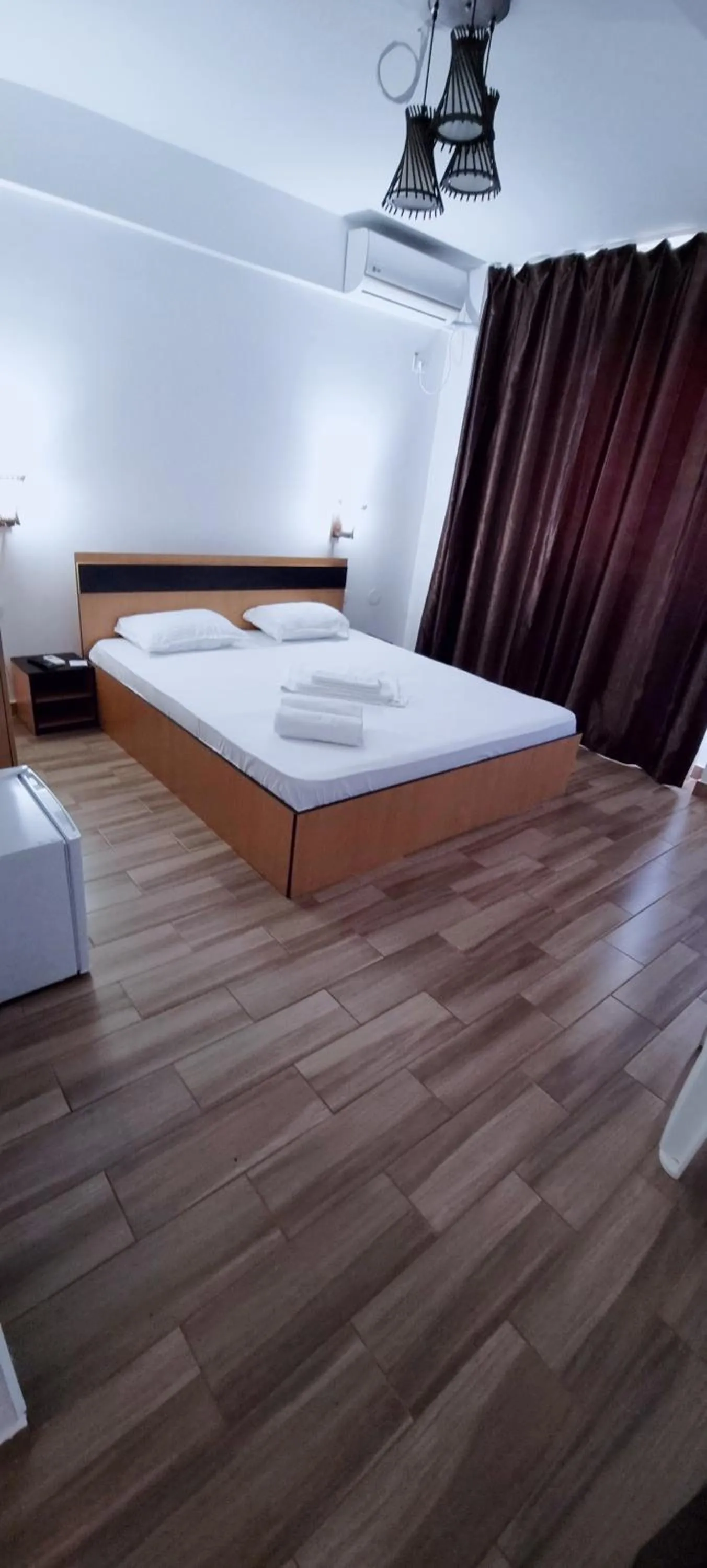 Bed in Hotel Blue Sky Resort