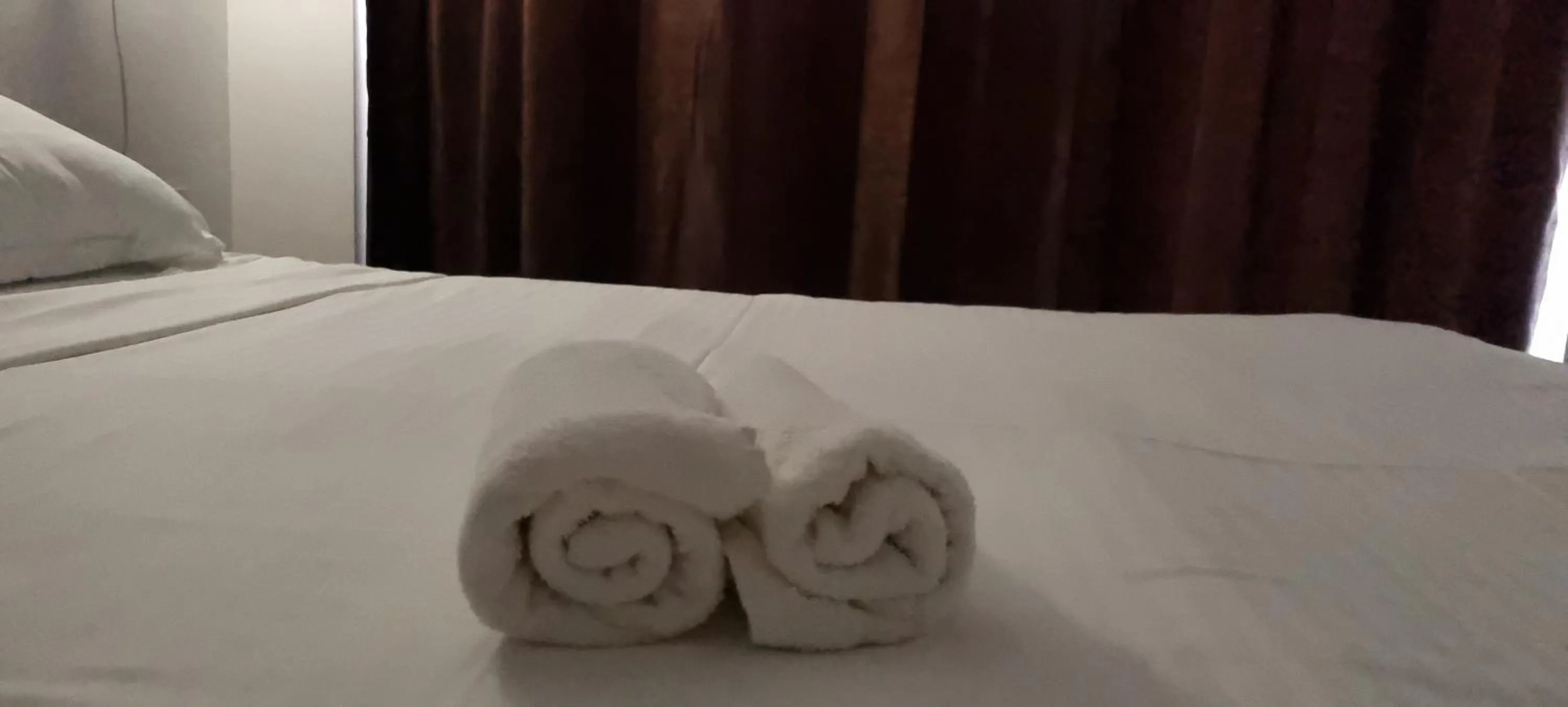 Bed in Hotel Blue Sky Resort