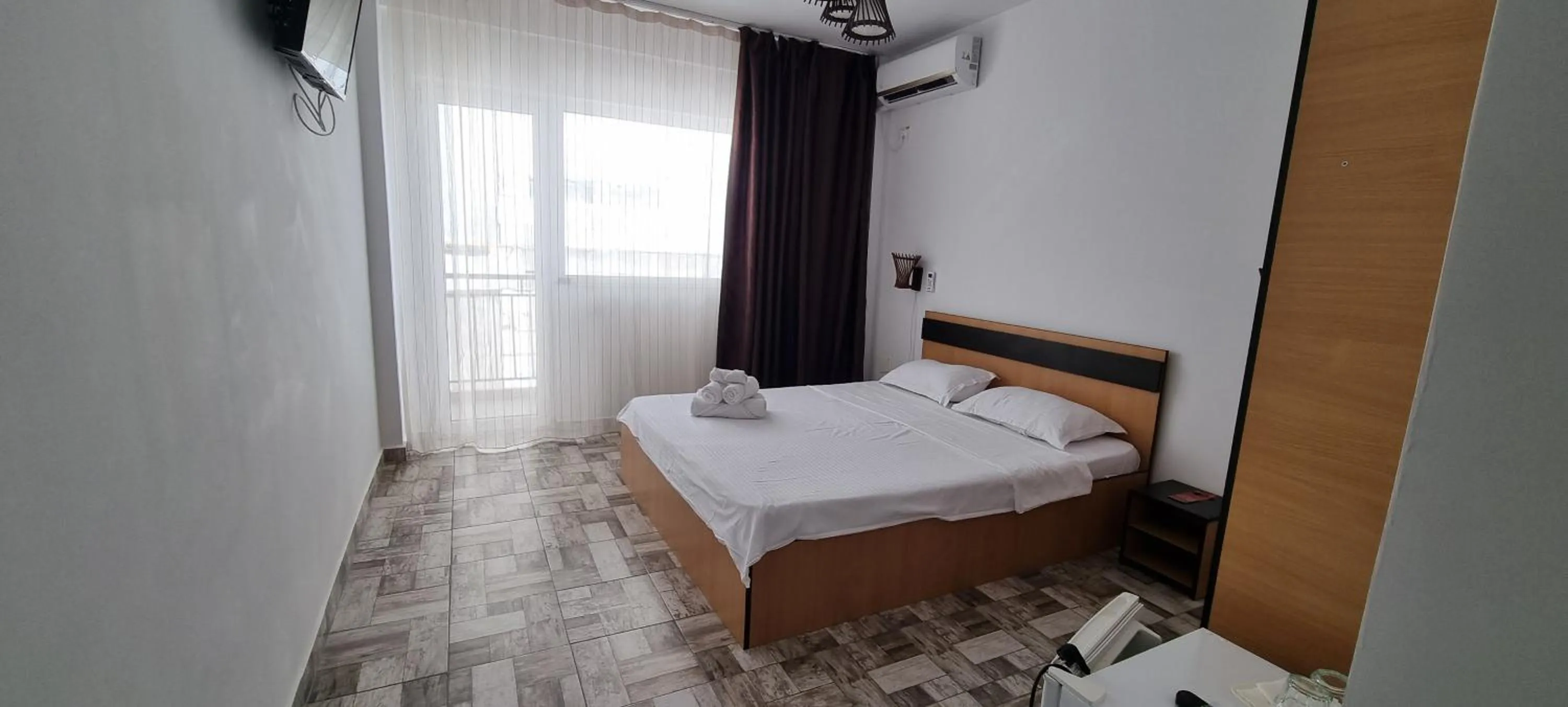 Bedroom in Hotel Blue Sky Resort