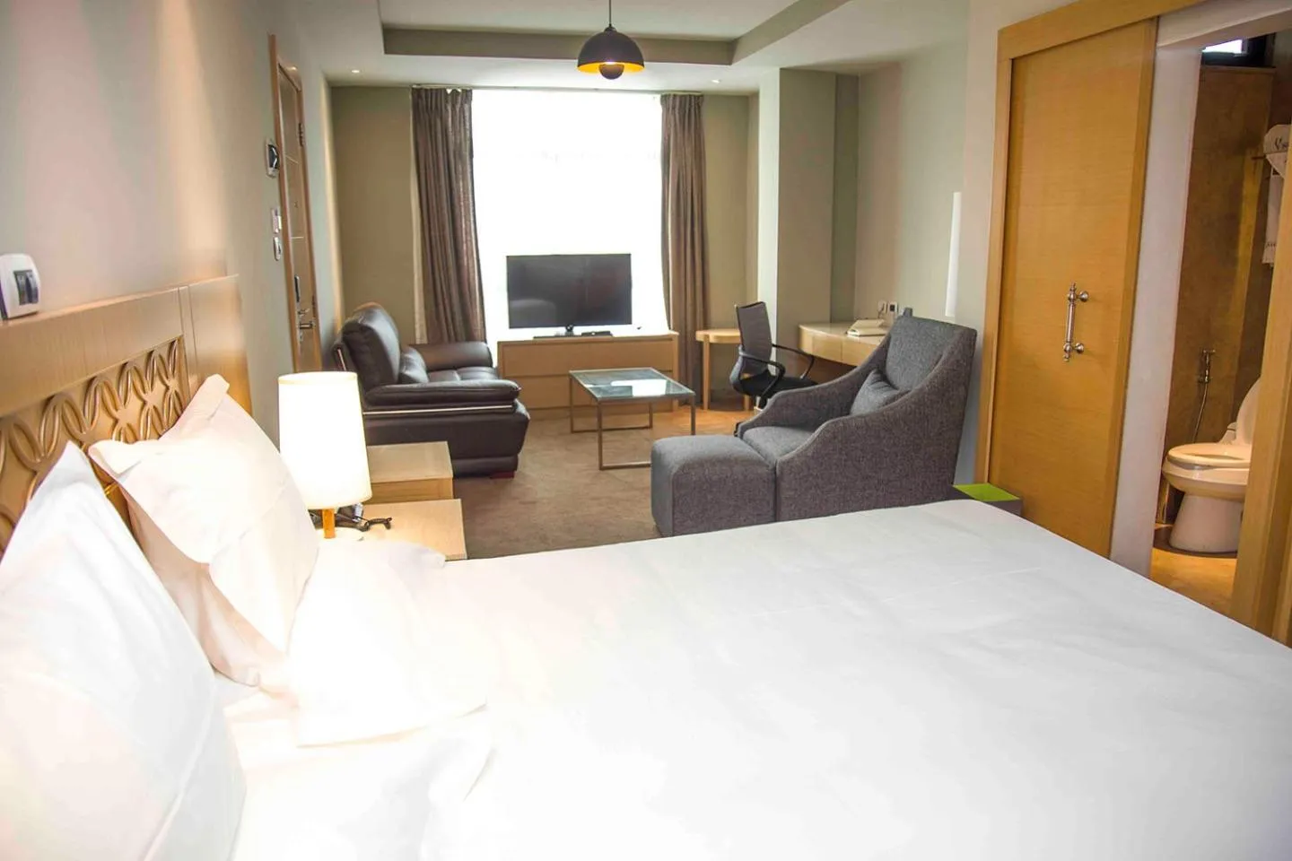 TV and multimedia, Bed in Vamos Addis Hotel