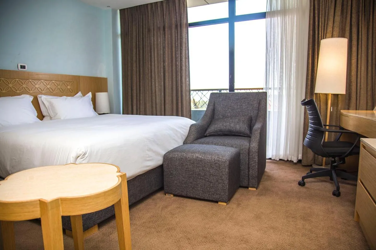 Seating area, Bed in Vamos Addis Hotel