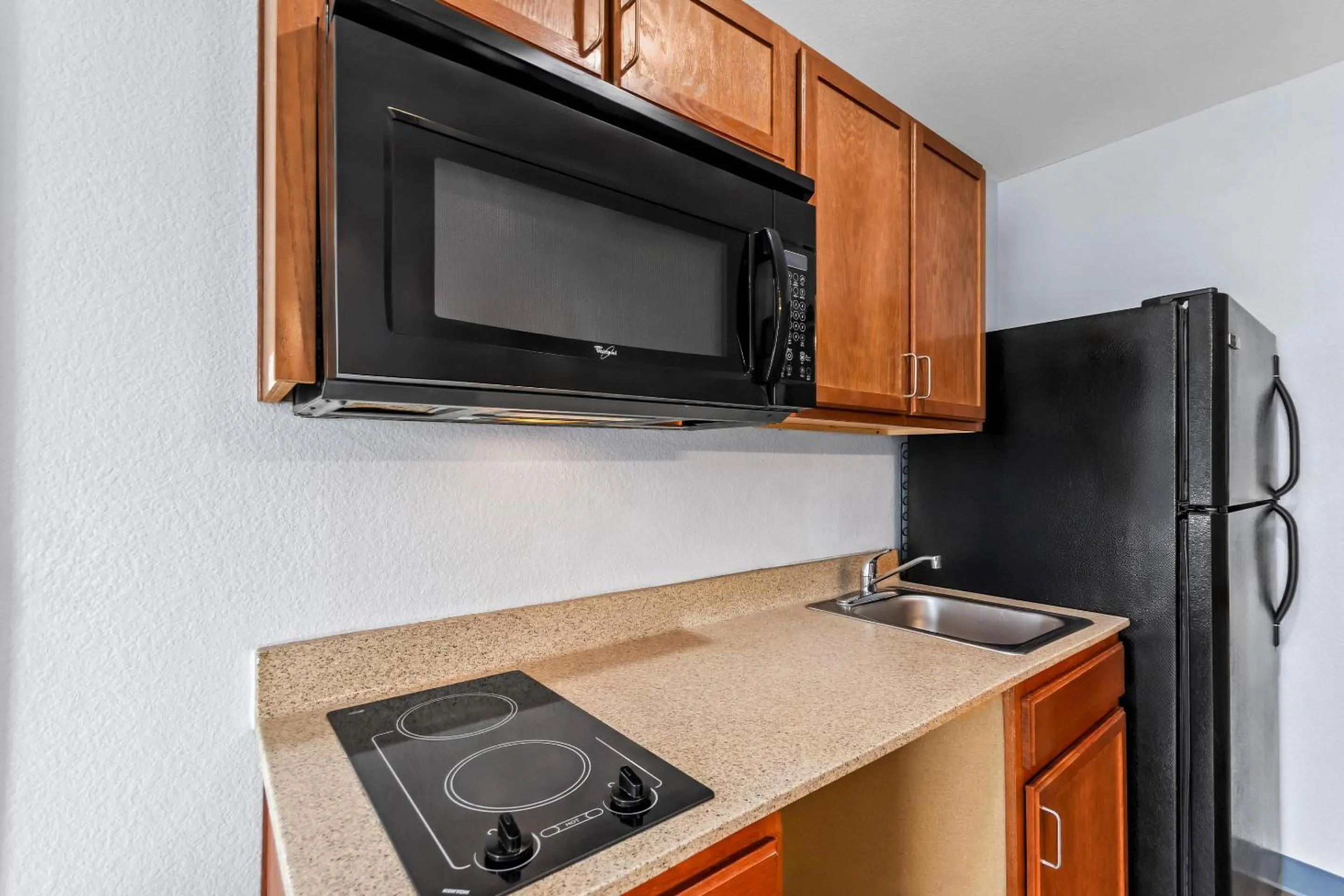 Bedroom in Suburban Studios Clarksville-Louisville North