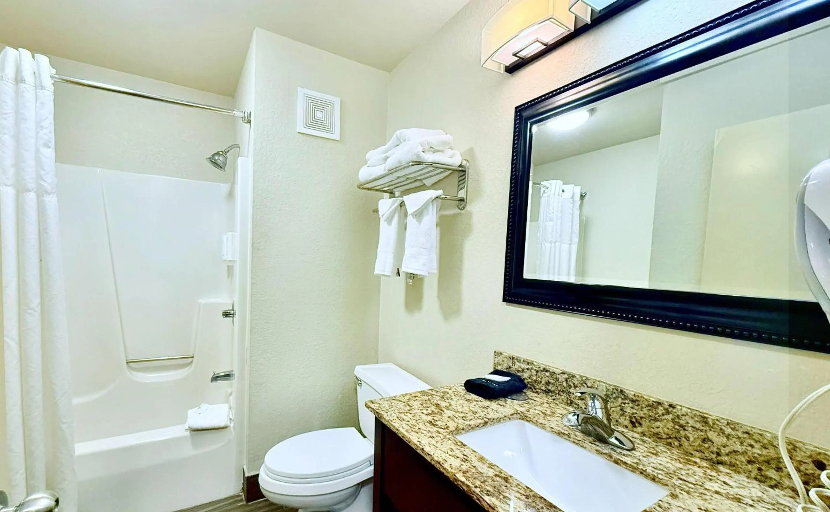 Bedroom in Clarion Inn & Suites Evansville Eastland Area