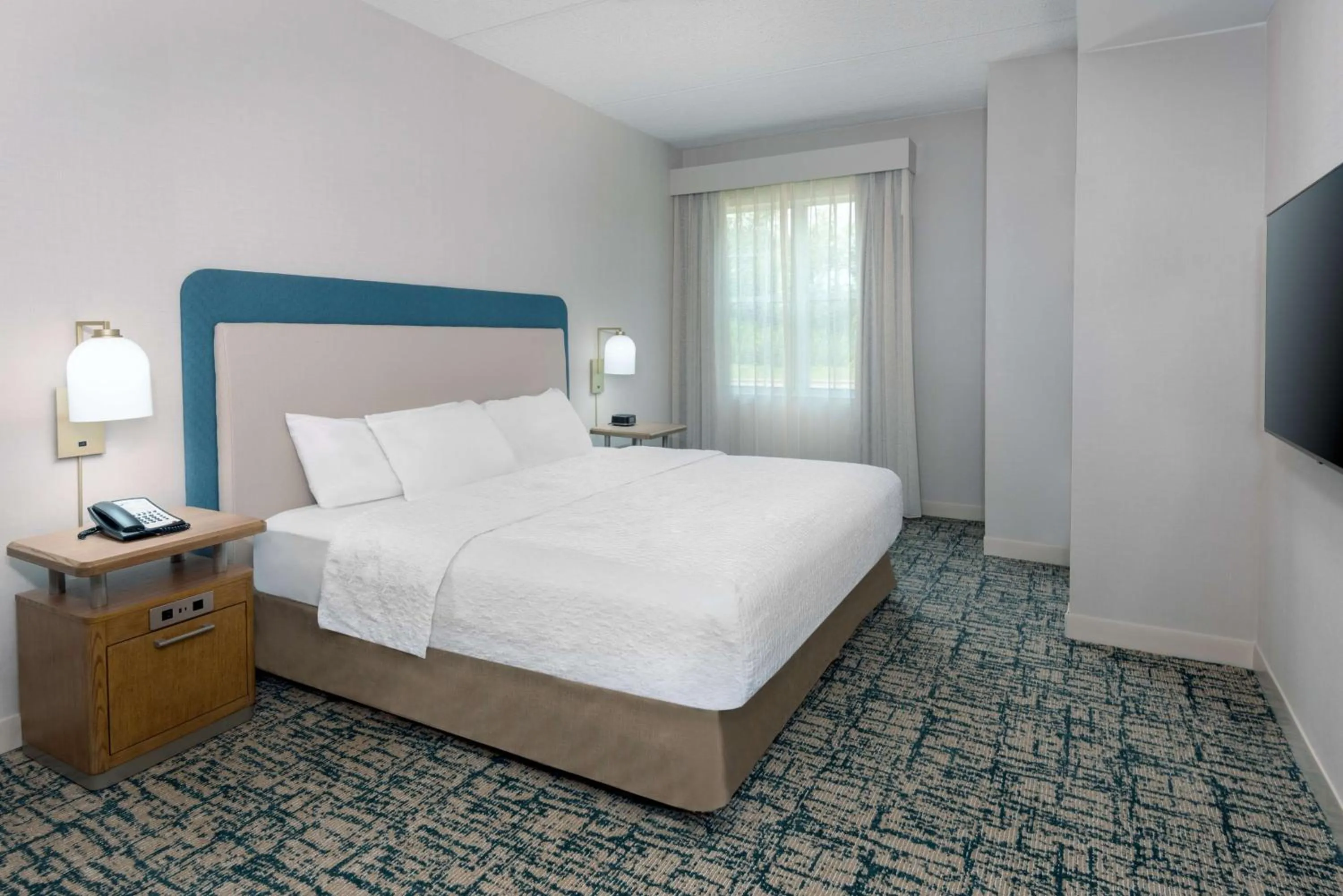 Bed in Homewood Suites by Hilton Buffalo/Airport