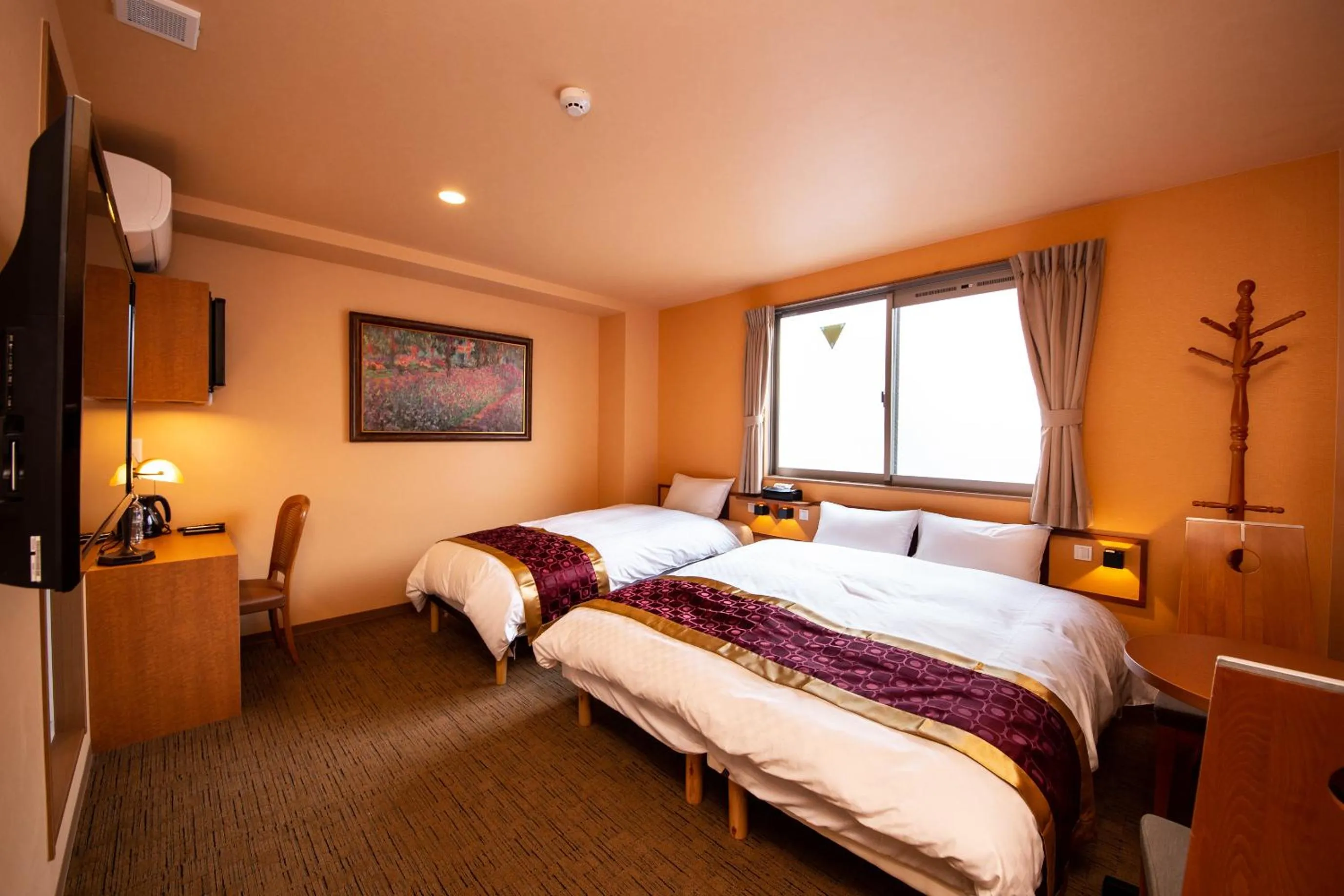 Bed in THE L.A. MART HOTEL KYOTO