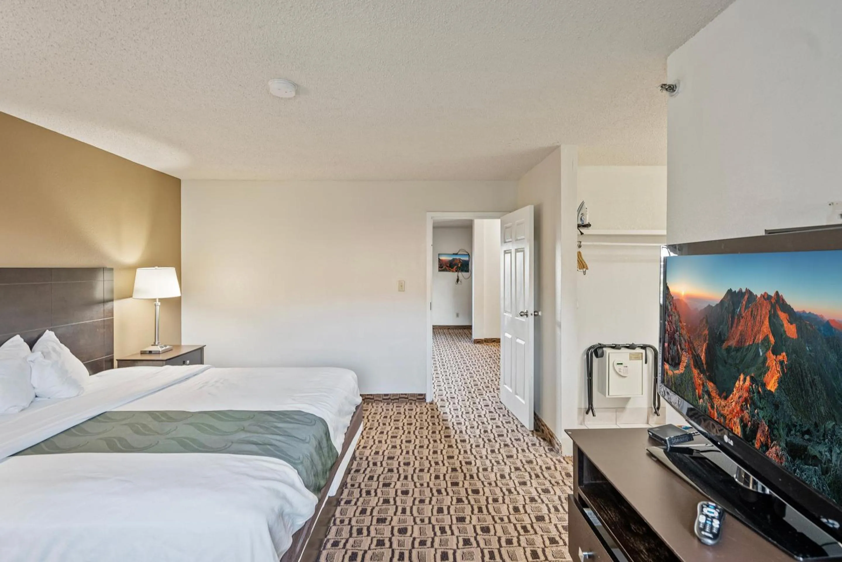 Bedroom, Bed in Coratel Plus Suites Wichita West Airport