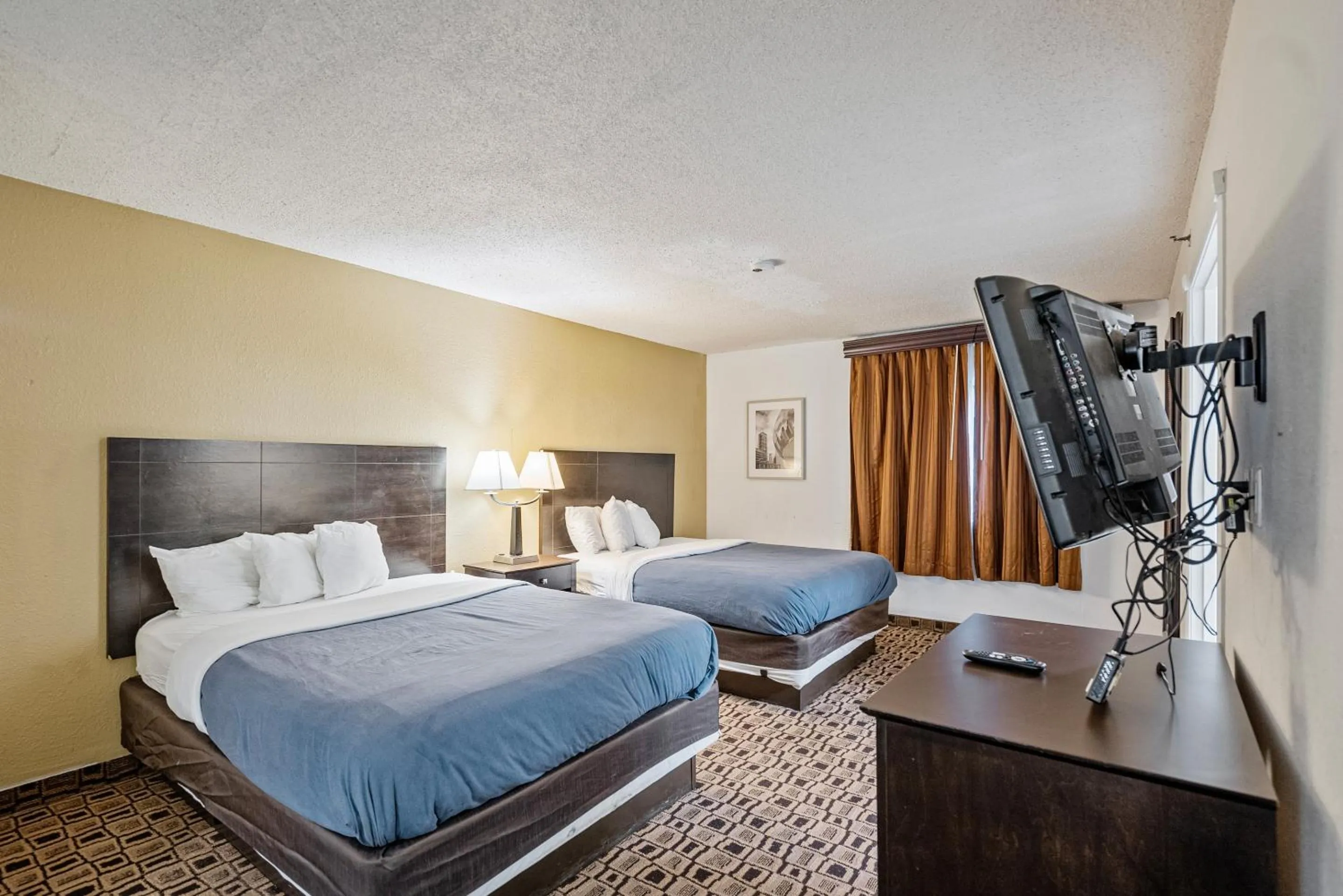 Bedroom, Bed in Coratel Plus Suites Wichita West Airport