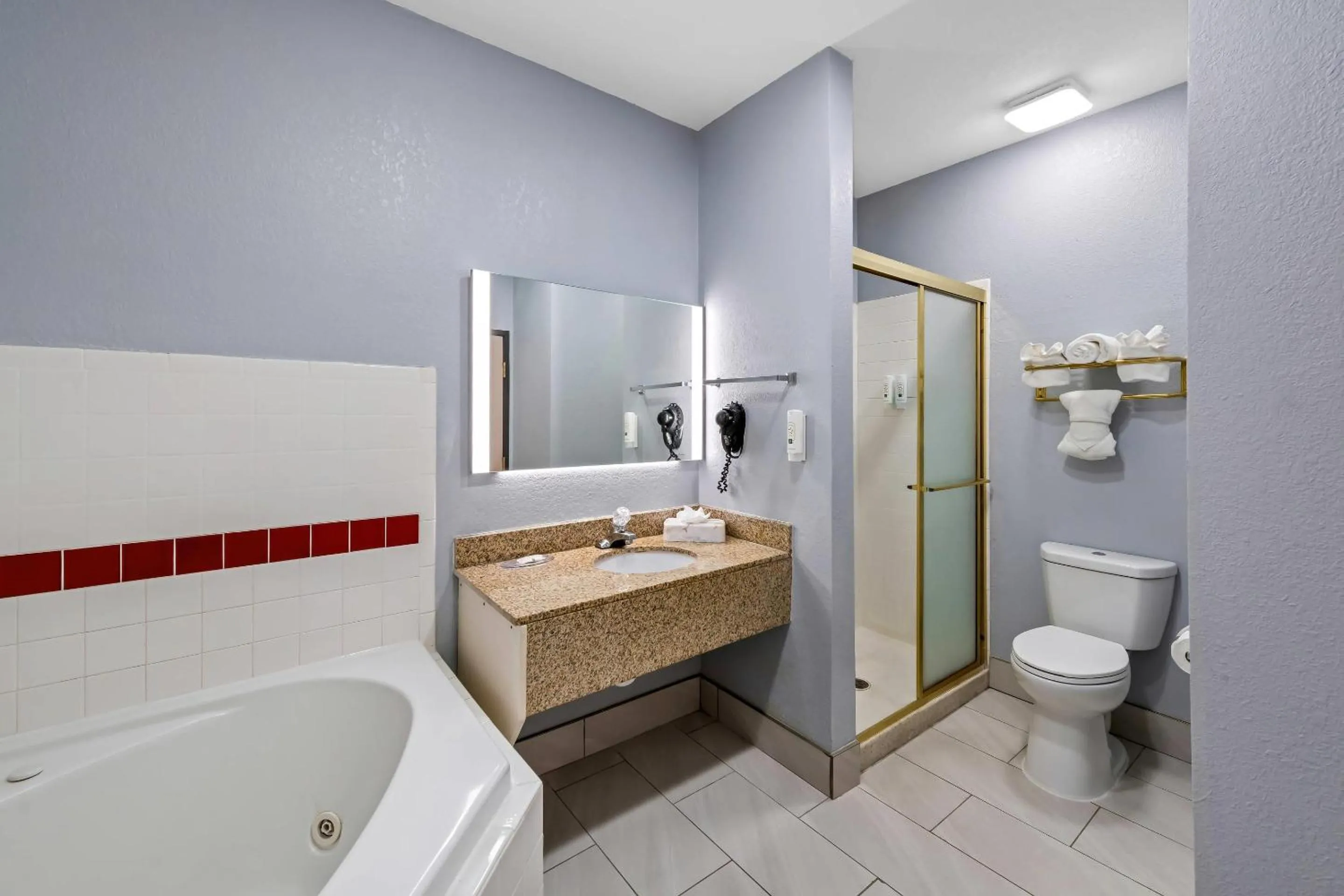 Bedroom in Quality Inn & Suites Manhattan