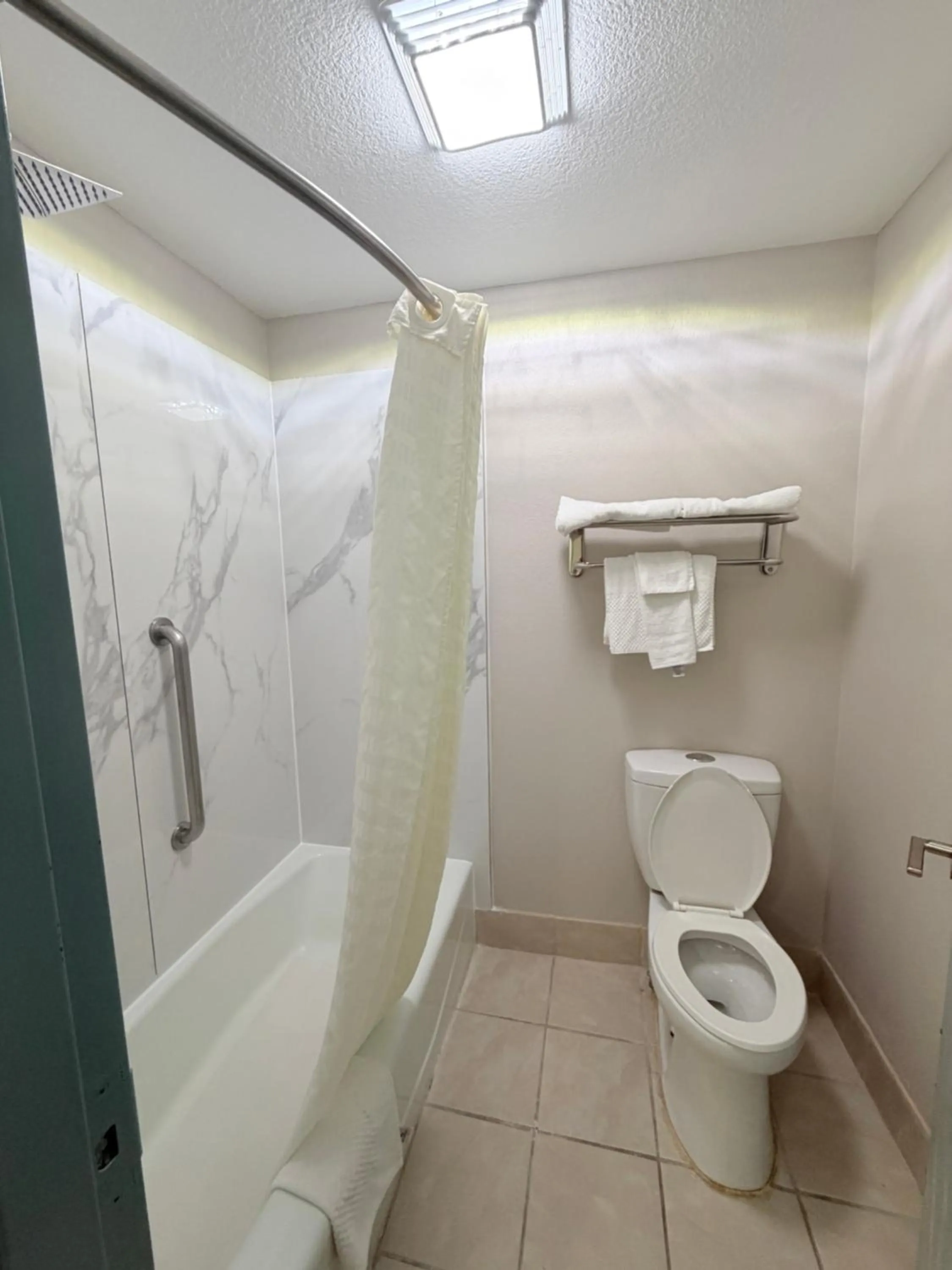 Bathroom in Sunflower Inn & Suites