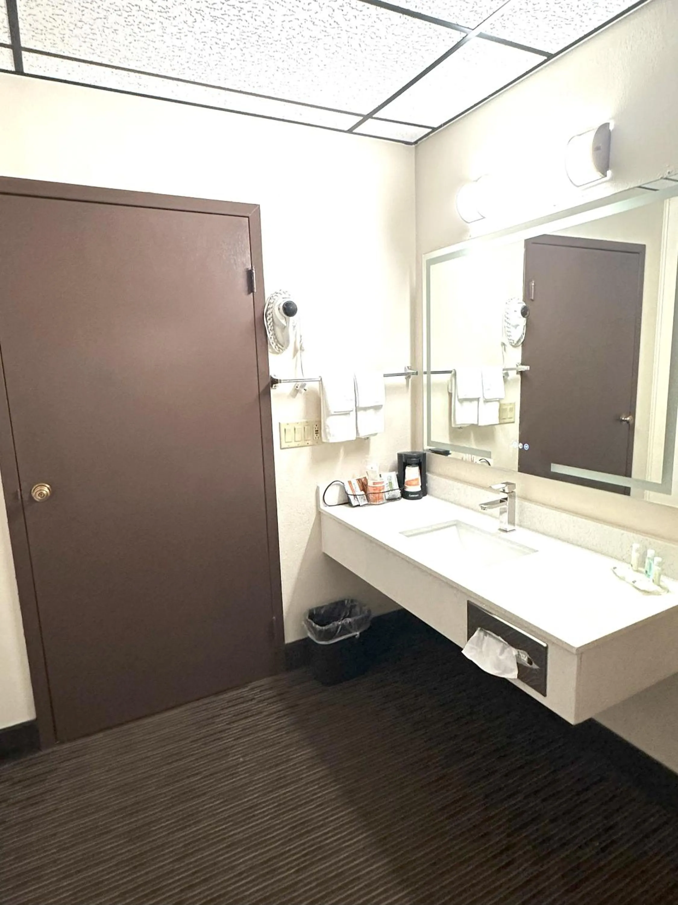 Bathroom in Sunflower Inn & Suites