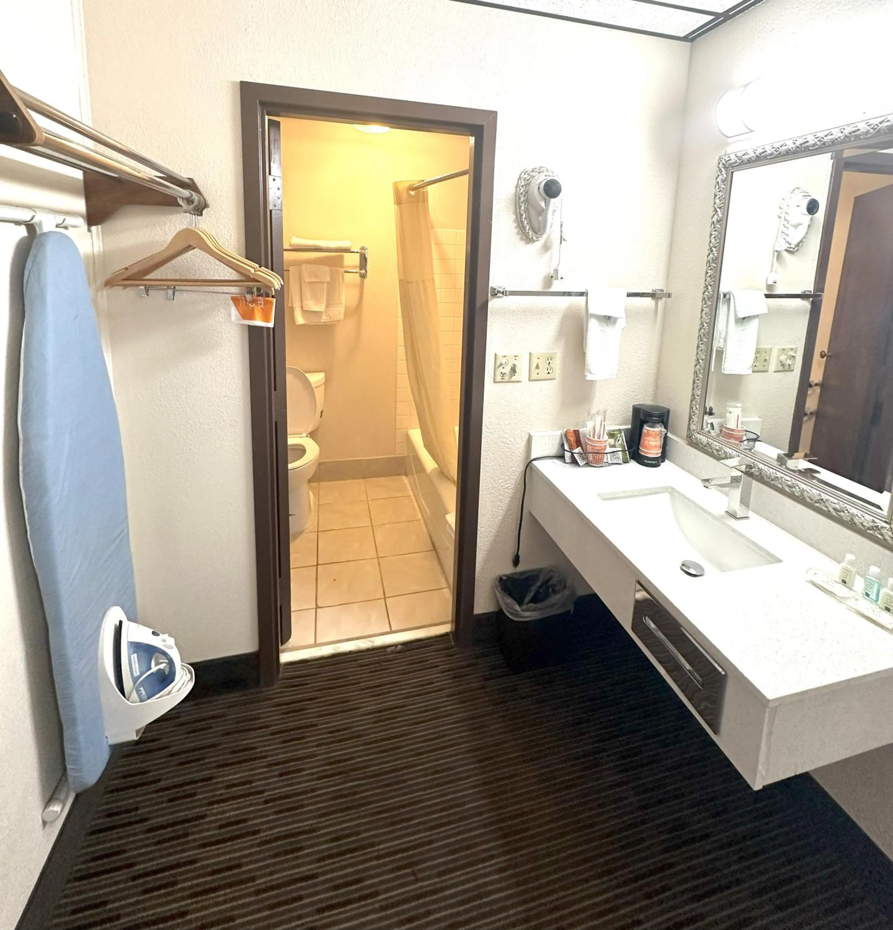 Bathroom in Sunflower Inn & Suites