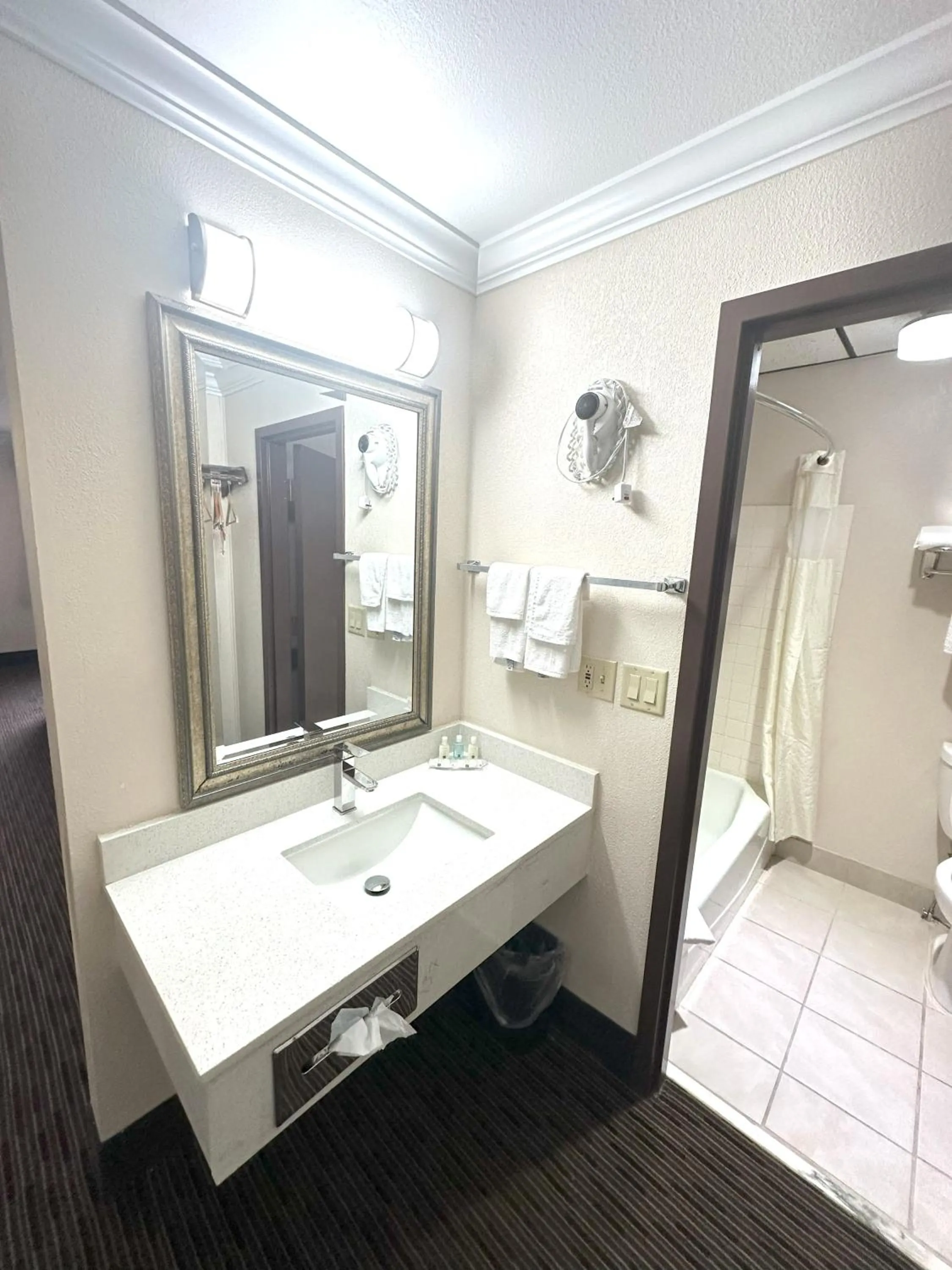 Bathroom in Sunflower Inn & Suites
