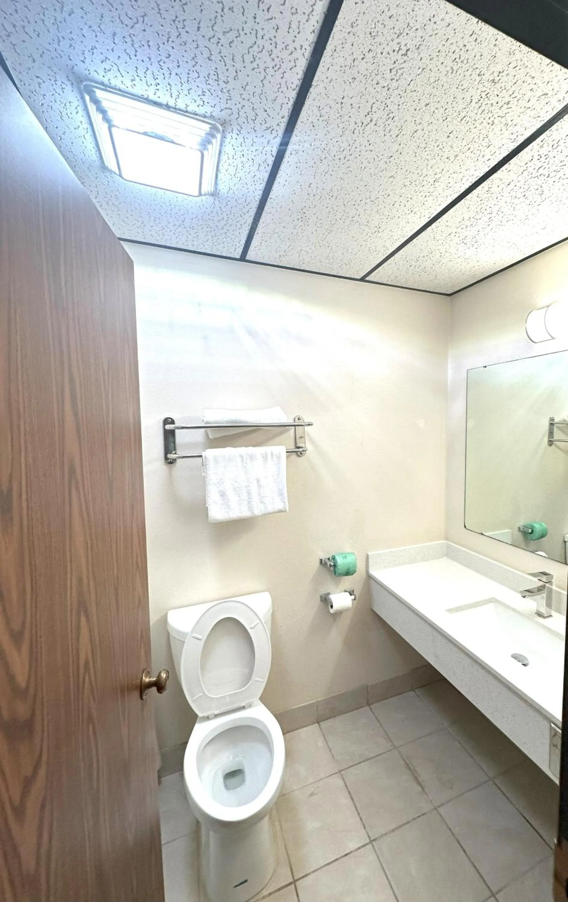 Toilet in Sunflower Inn & Suites