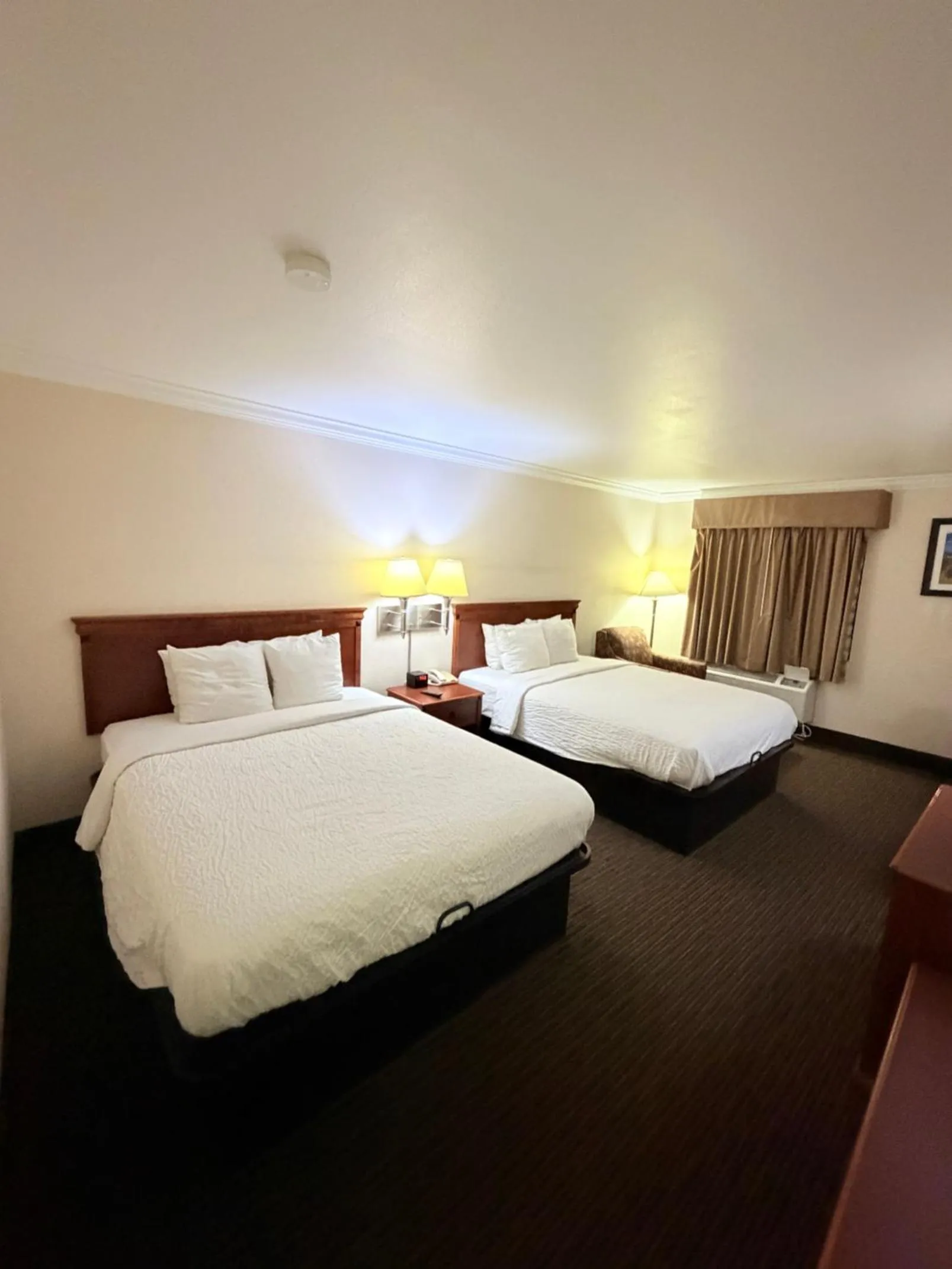 Bedroom, Bed in Sunflower Inn & Suites