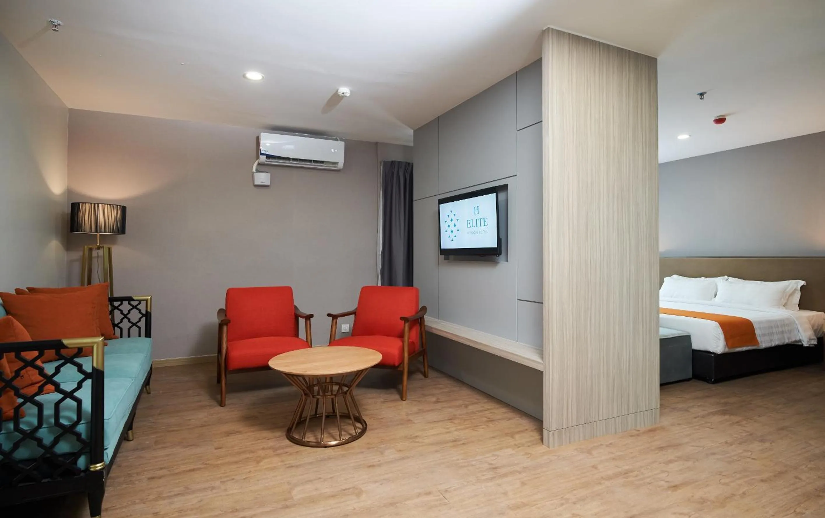 Living room, Bed in H Elite Design Hotel