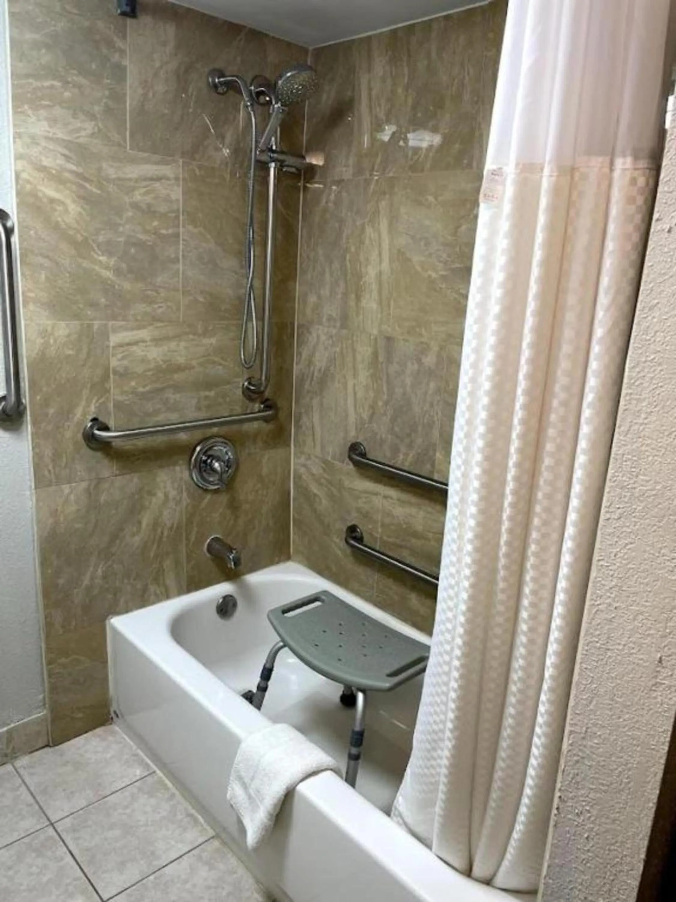 Bathroom in Days Inn by Wyndham Fort Wright Cincinnati Area