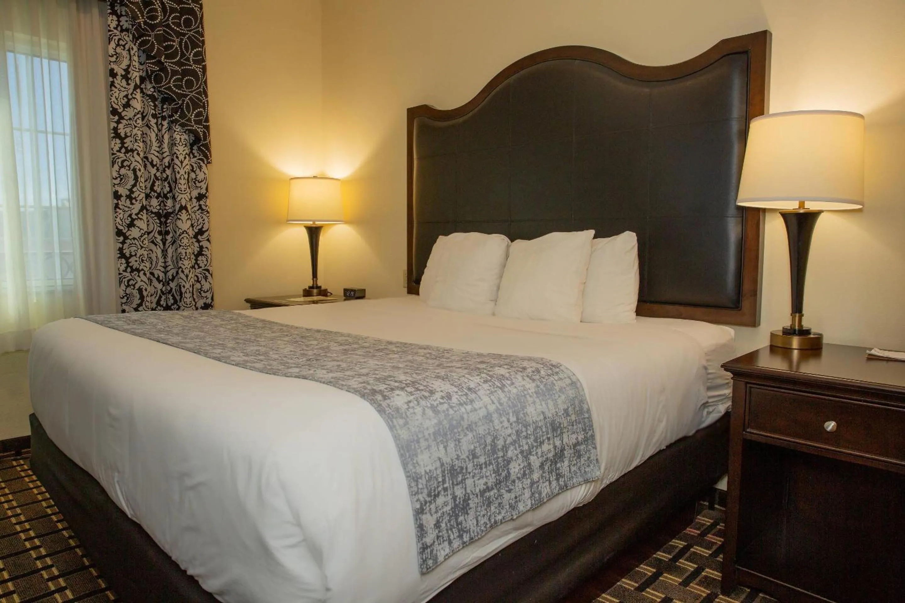 Bedroom, Bed in Evangeline Downs Hotel, an Ascend Collection Hotel