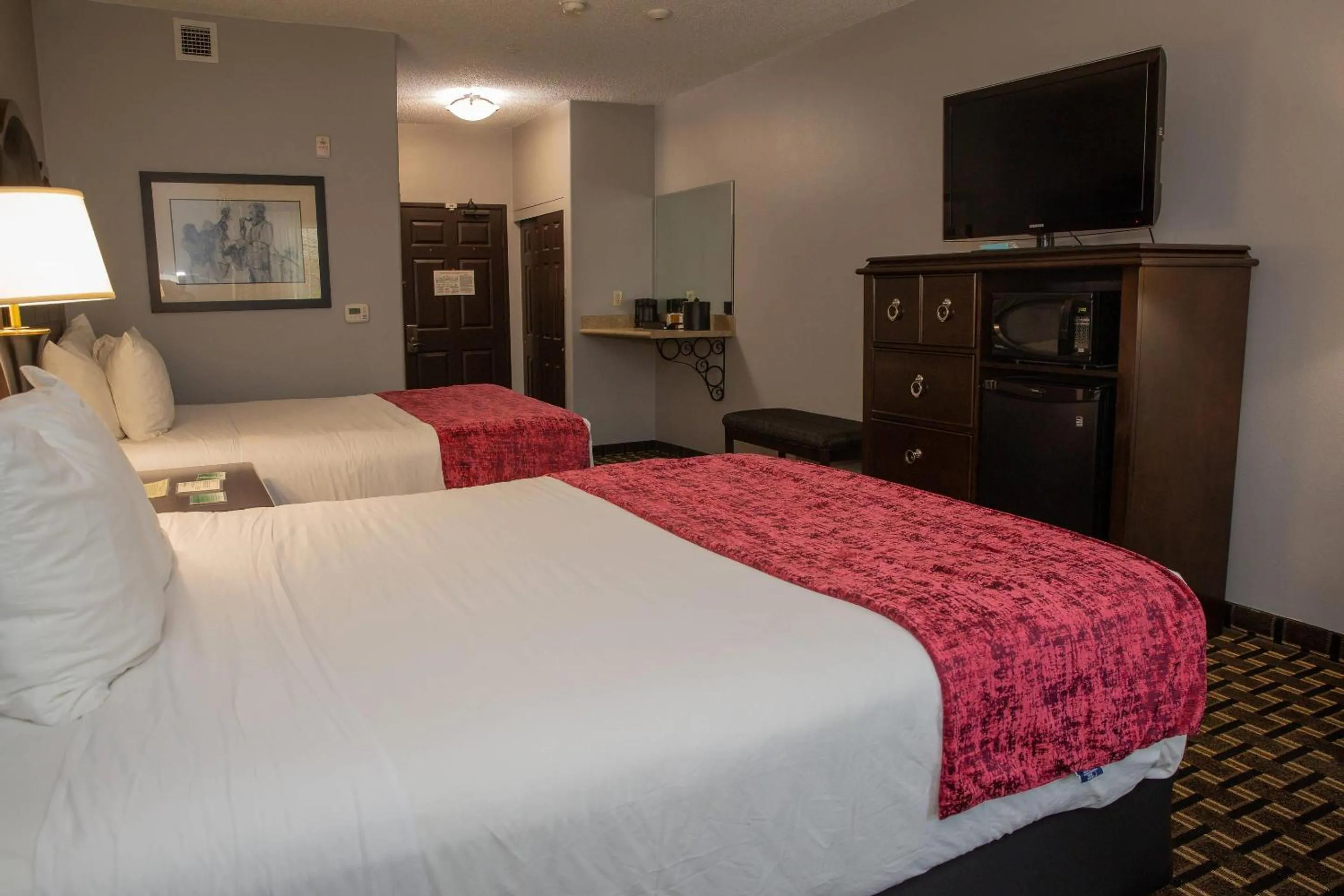 Bedroom, Bed in Evangeline Downs Hotel, an Ascend Collection Hotel