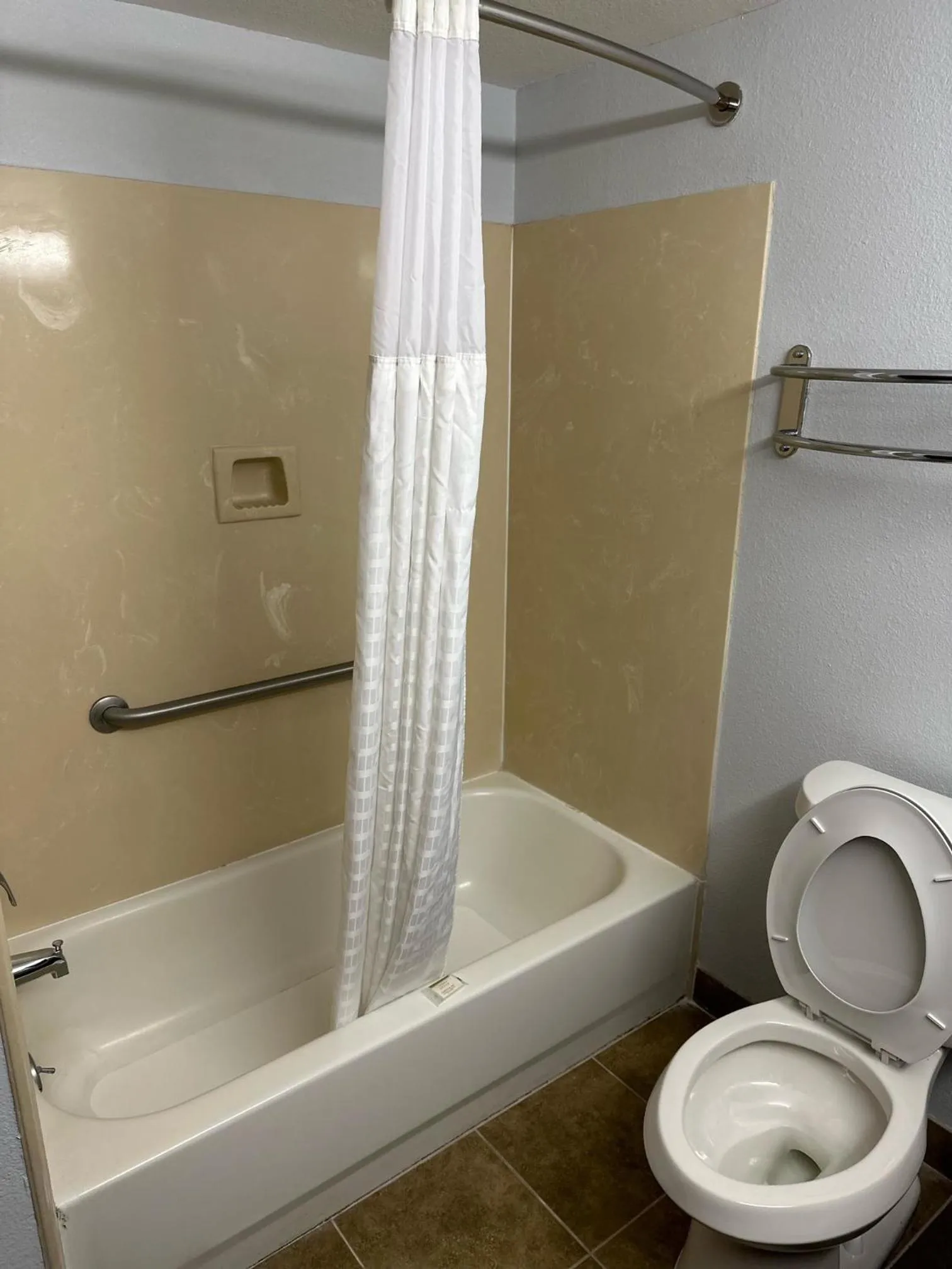 Toilet in Super 8 by Wyndham Alexandria LA