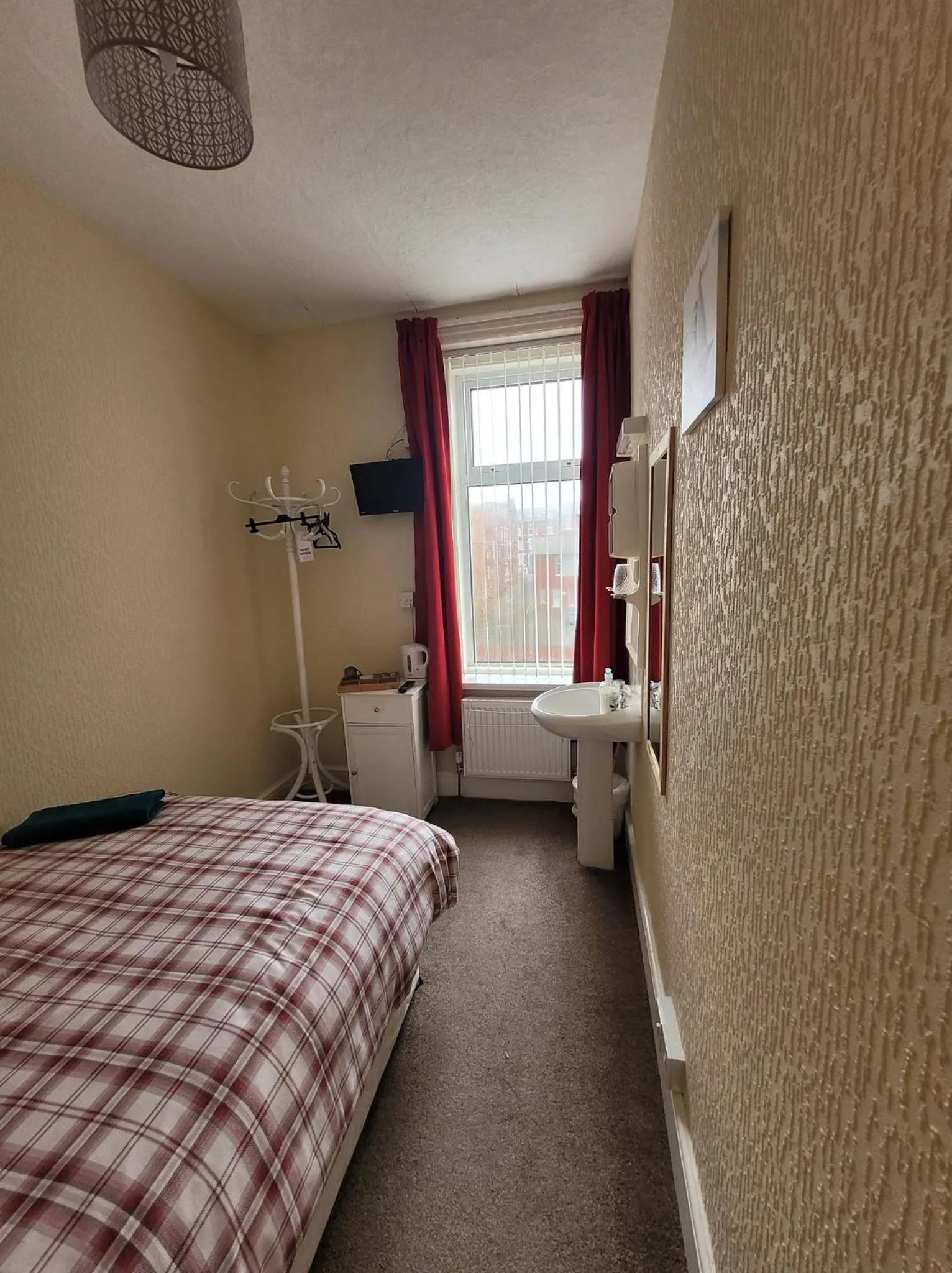 Photo of the whole room, Bed in The Clevedon