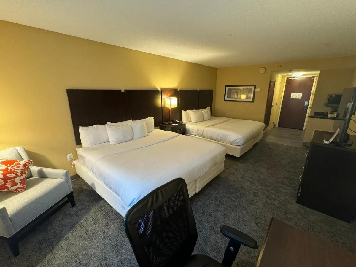 Bed in Comfort Inn & Suites Lexington Park near Pax River
