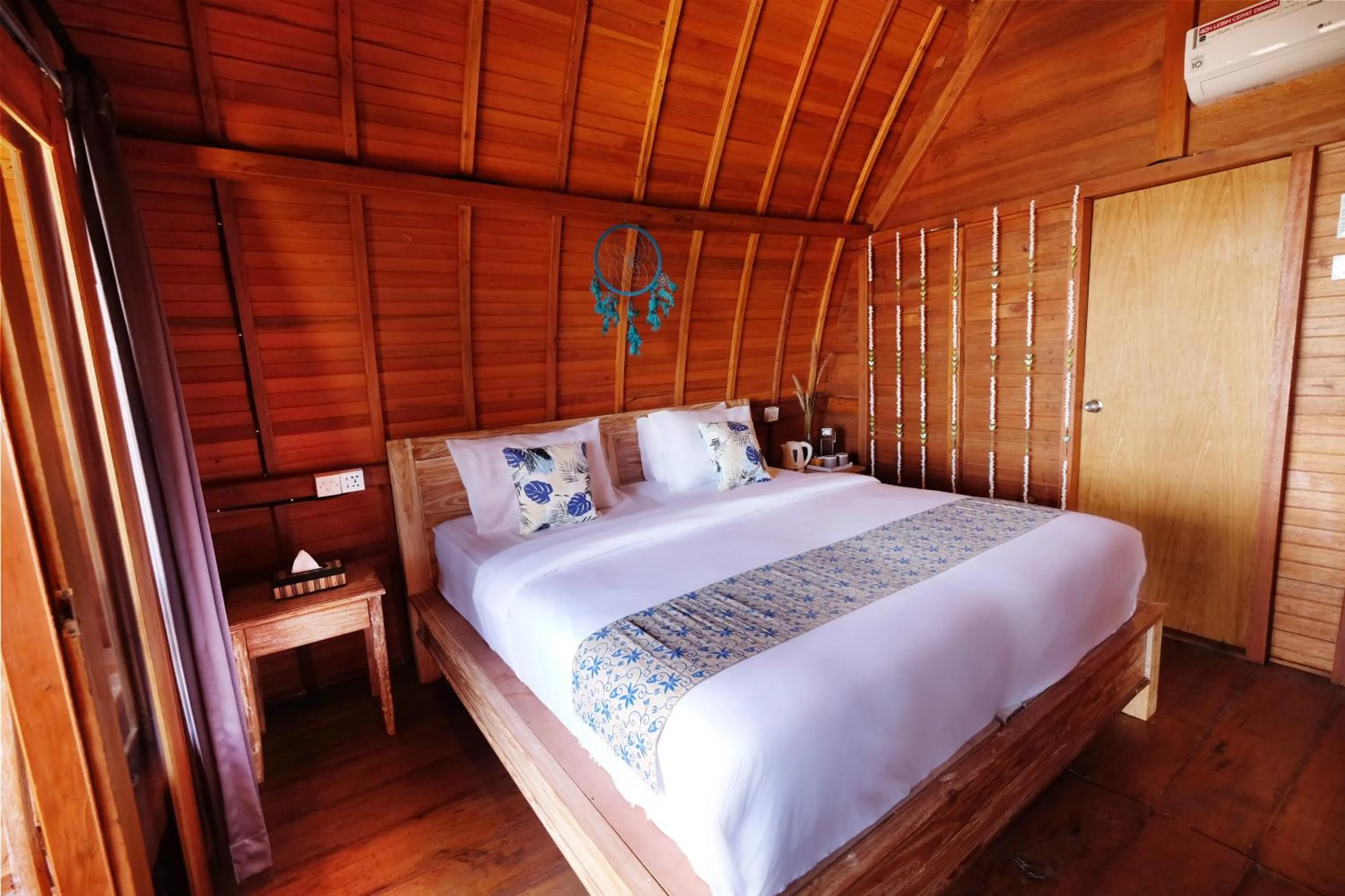 Bed in Adara Beach Huts
