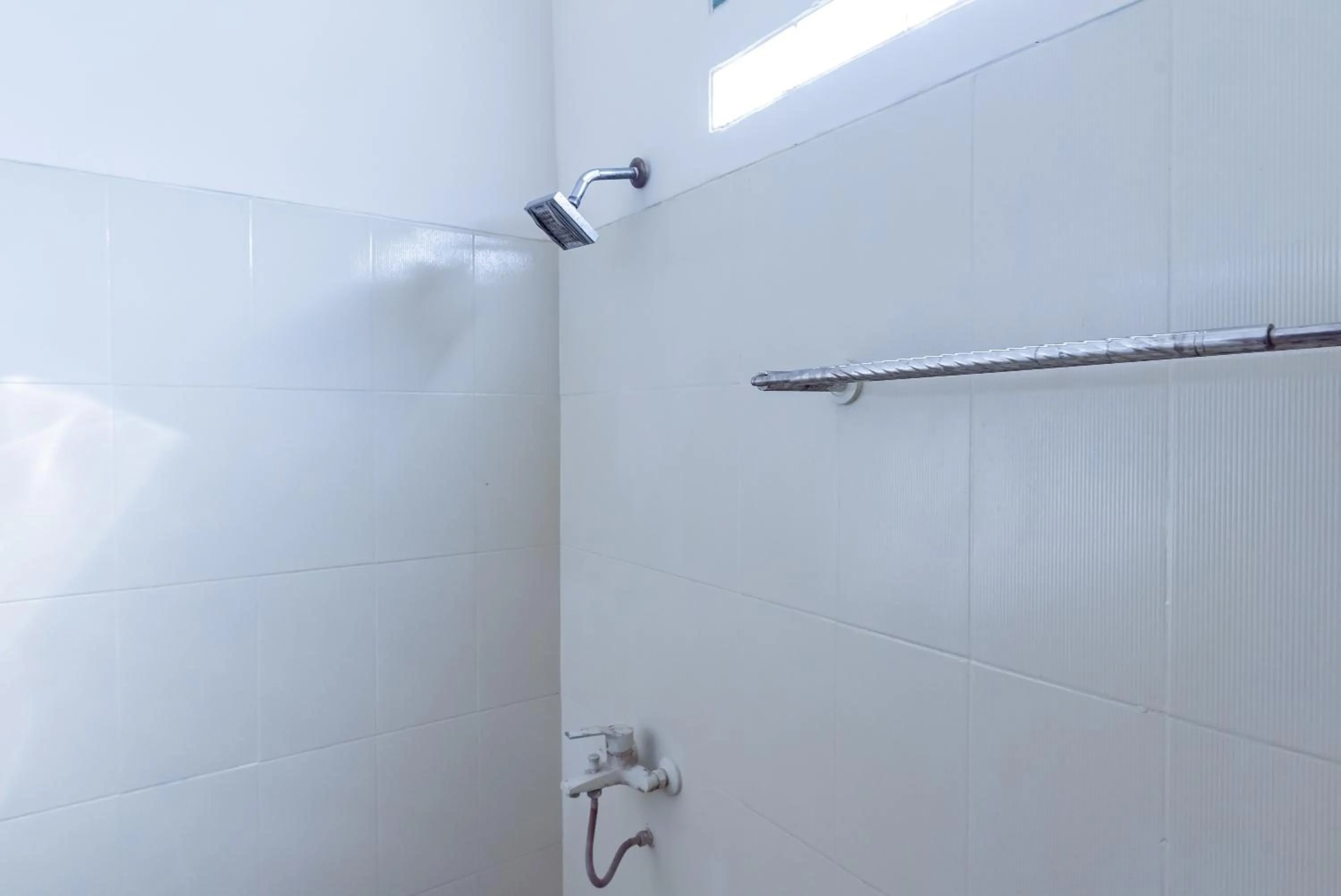 Bathroom in RedDoorz near Pasar Pagi 2 by Cassana