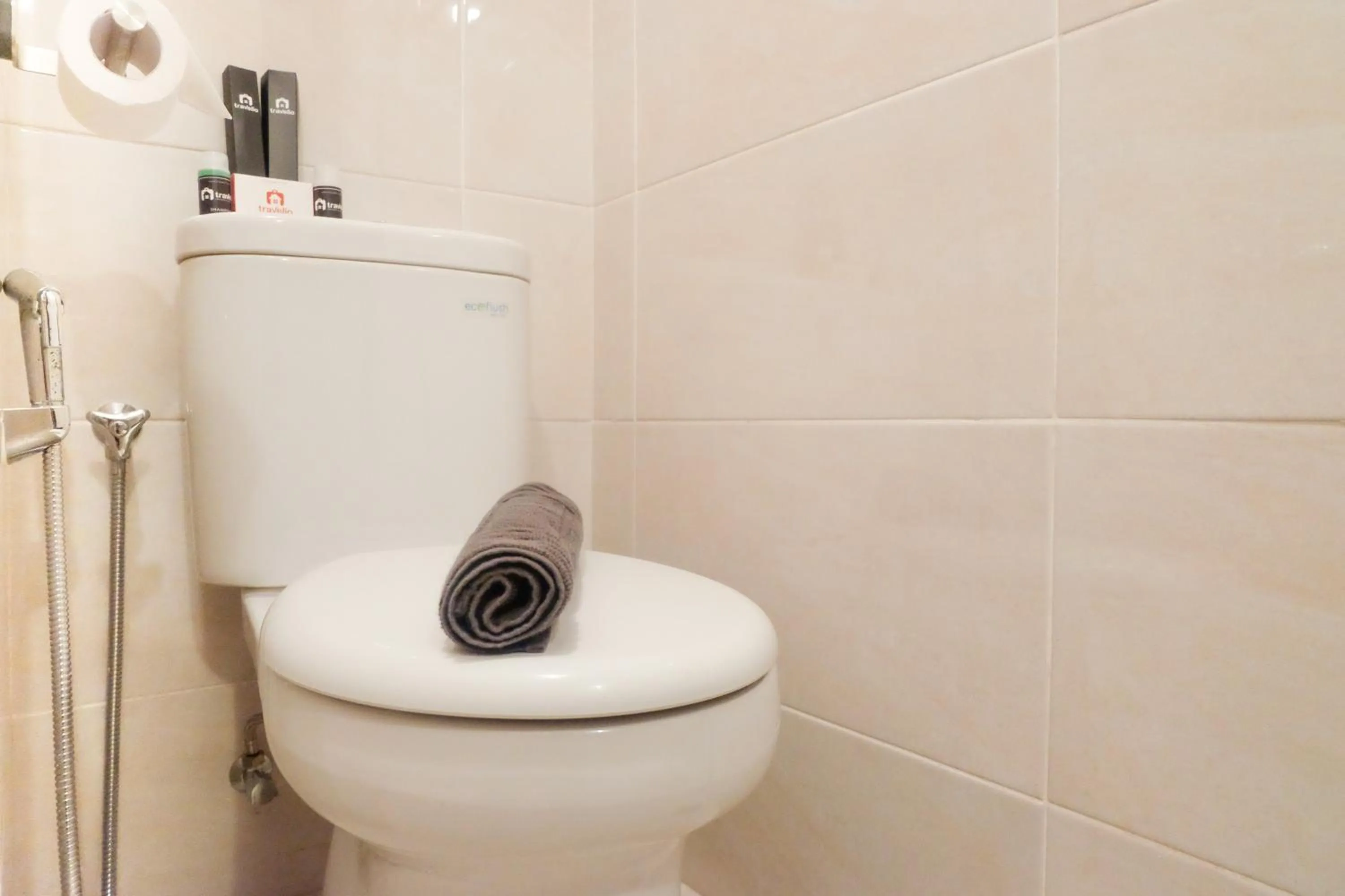 Bathroom in Modern Apartment Studio No Kitchen Mustika Golf Residence By Travelio