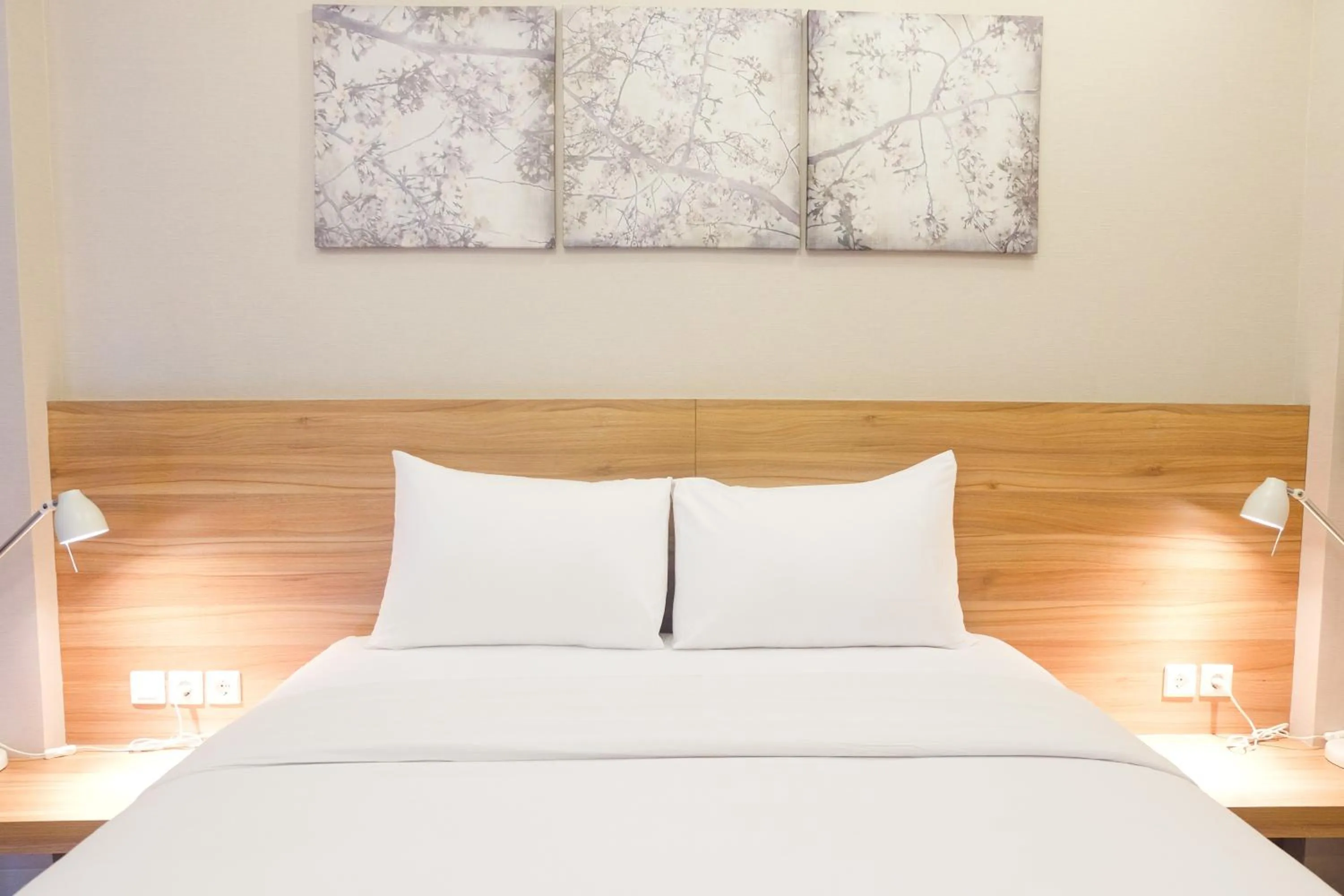 Bed in Modern Apartment Studio No Kitchen Mustika Golf Residence By Travelio