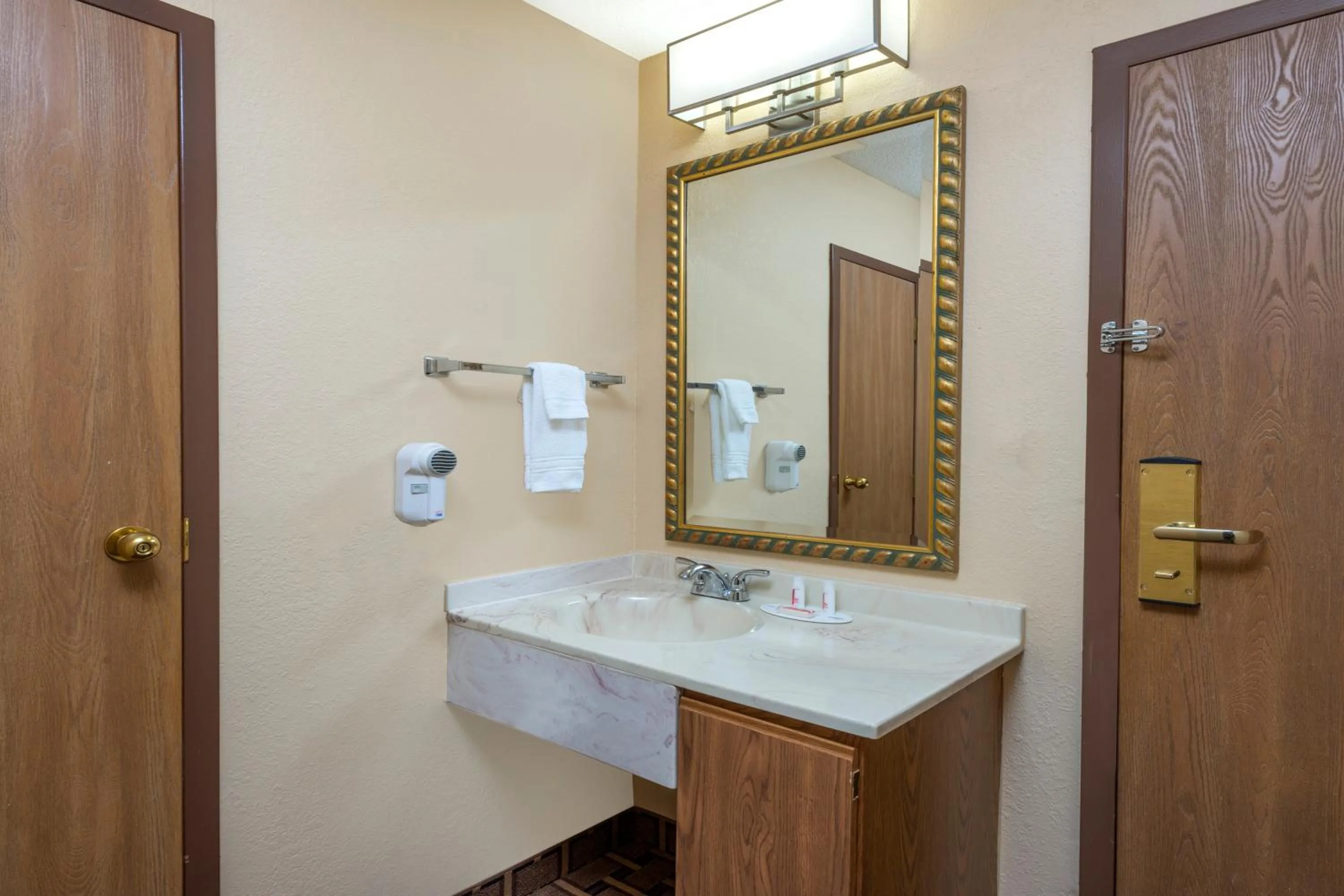 Bathroom in Super 8 by Wyndham Charleston Sikeston East MO