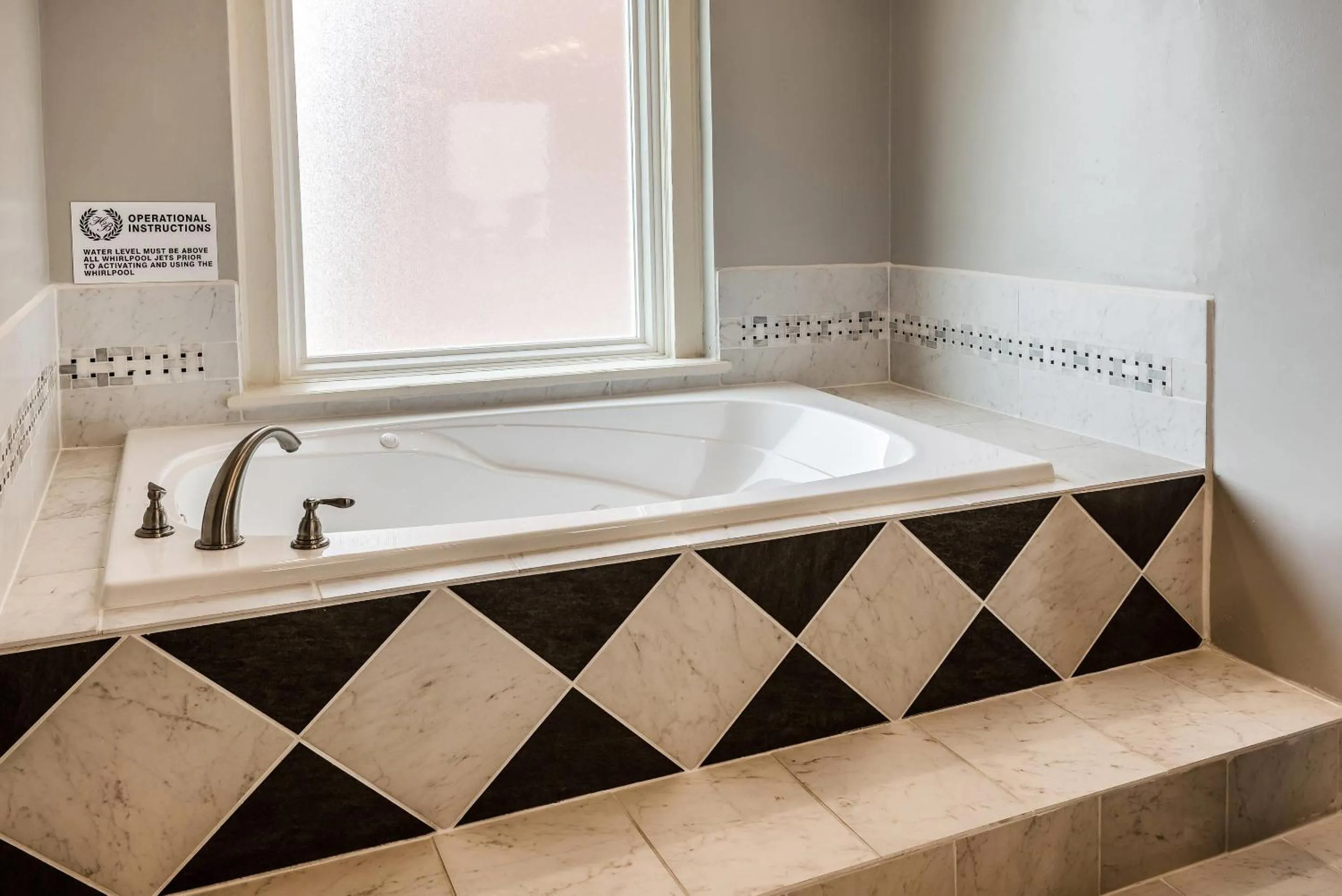 Bedroom in Hotel Bothwell Sedalia Central District, an Ascend Collection Hotel