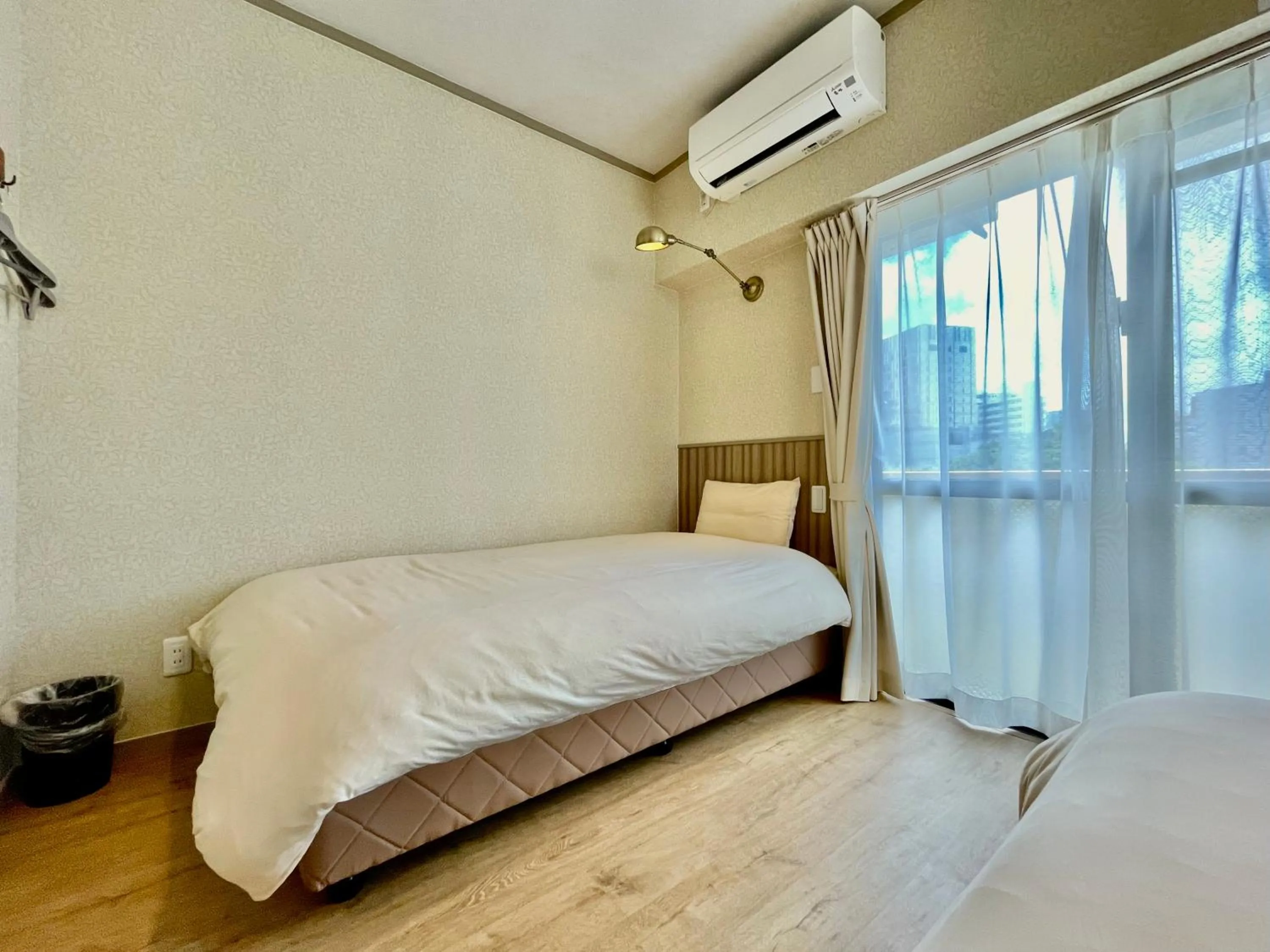 Bed in ホテル天使館 久茂地 -Tenshi-Kan-