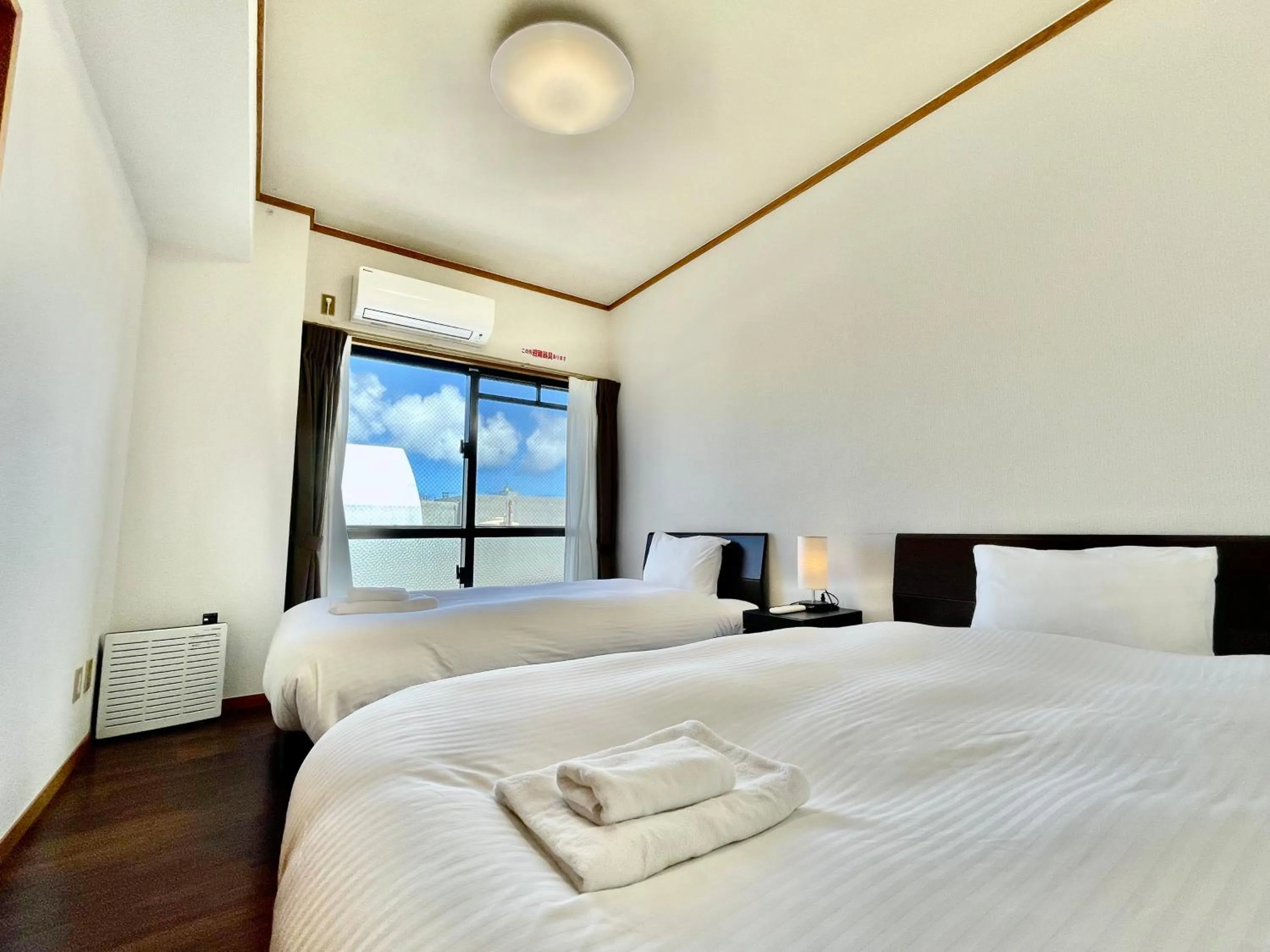 Bed in ホテル天使館 久茂地 -Tenshi-Kan-