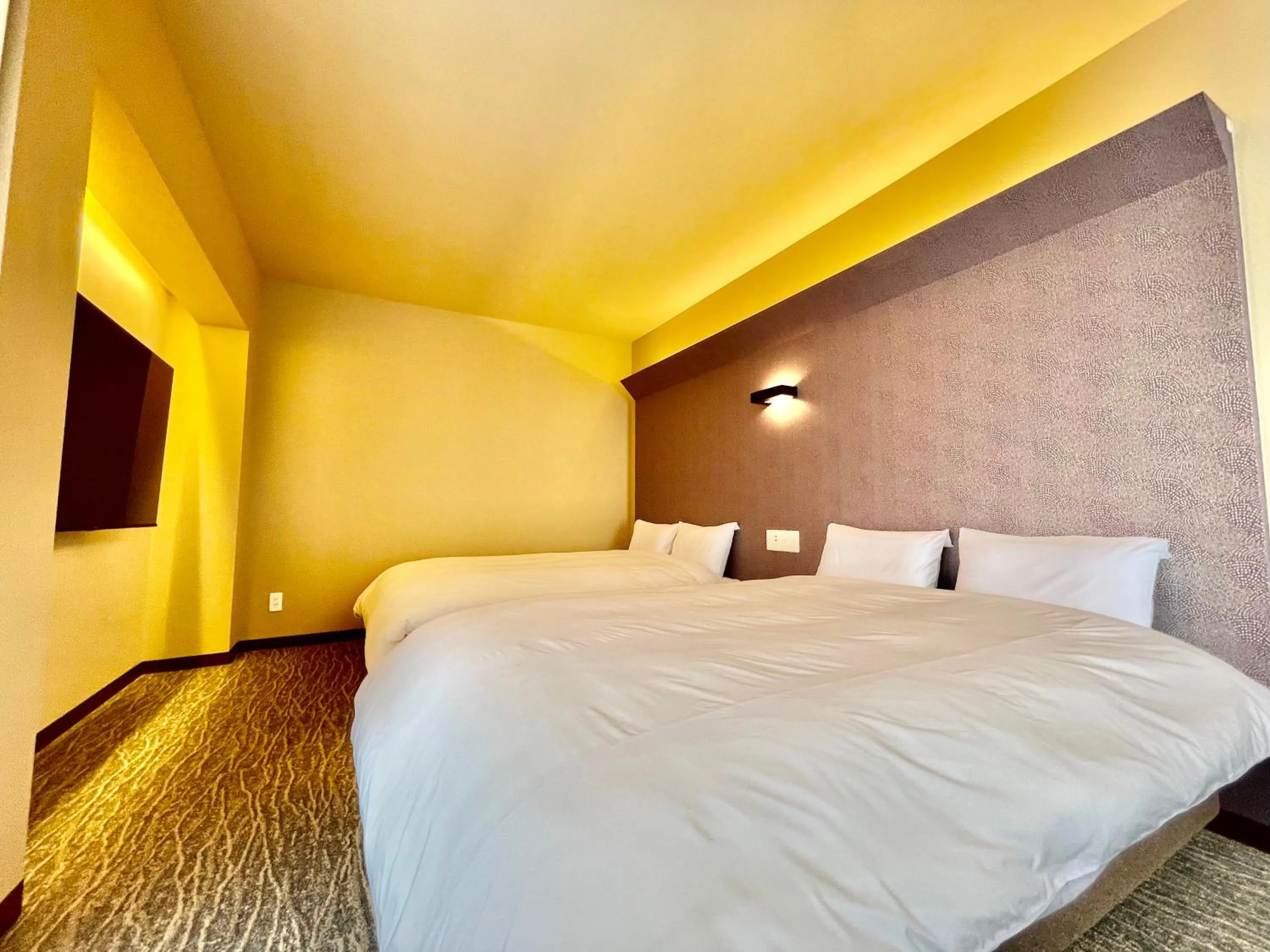 Bed in ホテル天使館 久茂地 -Tenshi-Kan-