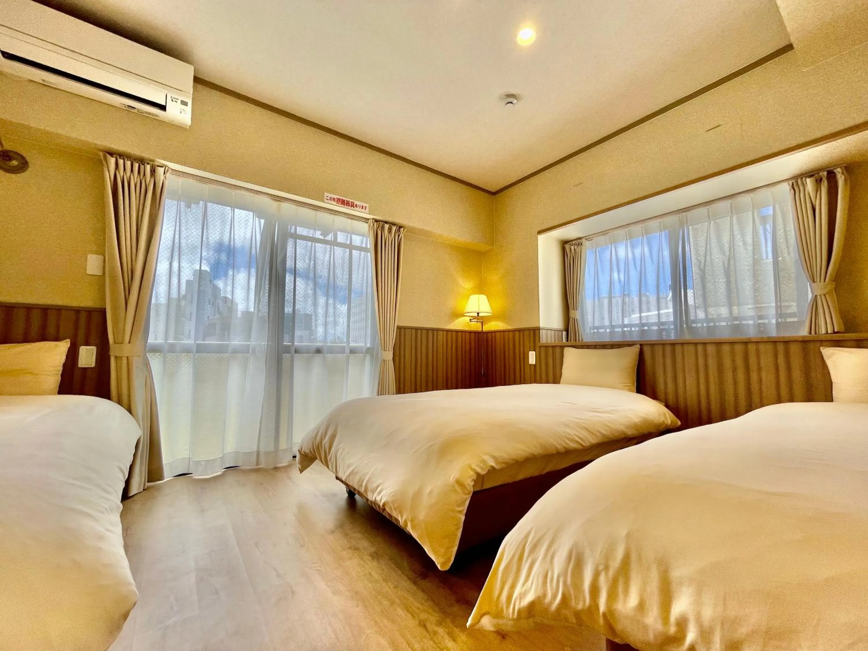 Bed in ホテル天使館 久茂地 -Tenshi-Kan-