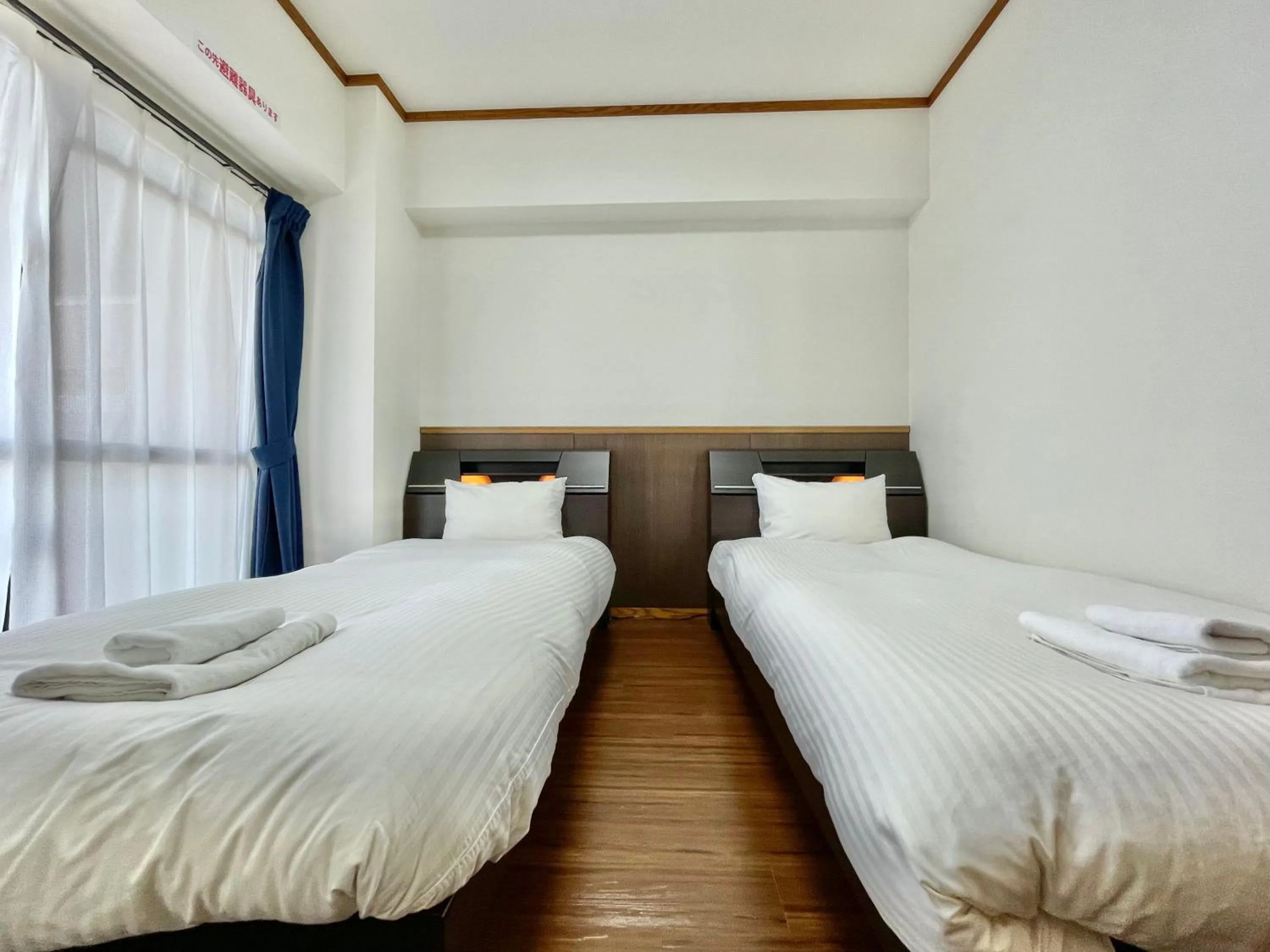 Bed in ホテル天使館 久茂地 -Tenshi-Kan-