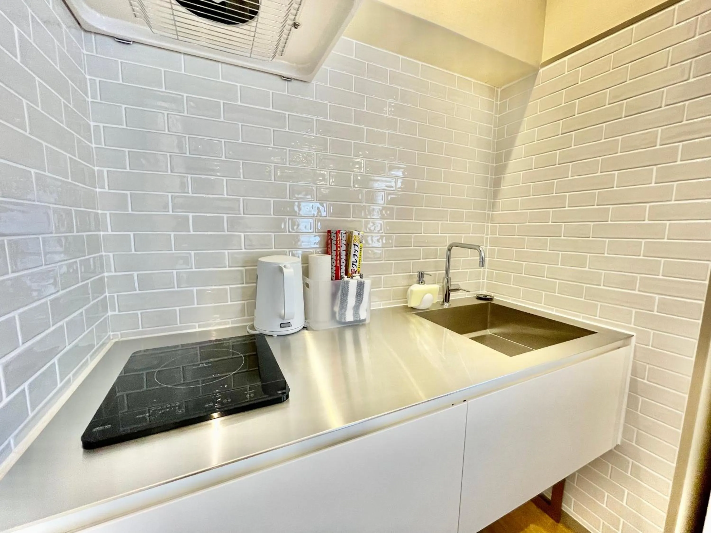 Kitchen or kitchenette in ホテル天使館 久茂地 -Tenshi-Kan-