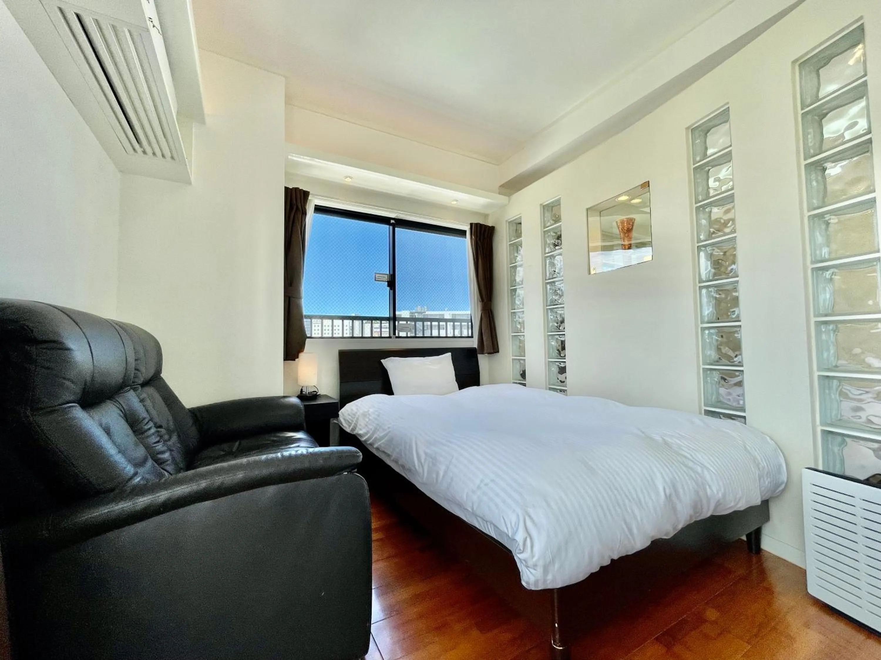 Bed in ホテル天使館 久茂地 -Tenshi-Kan-